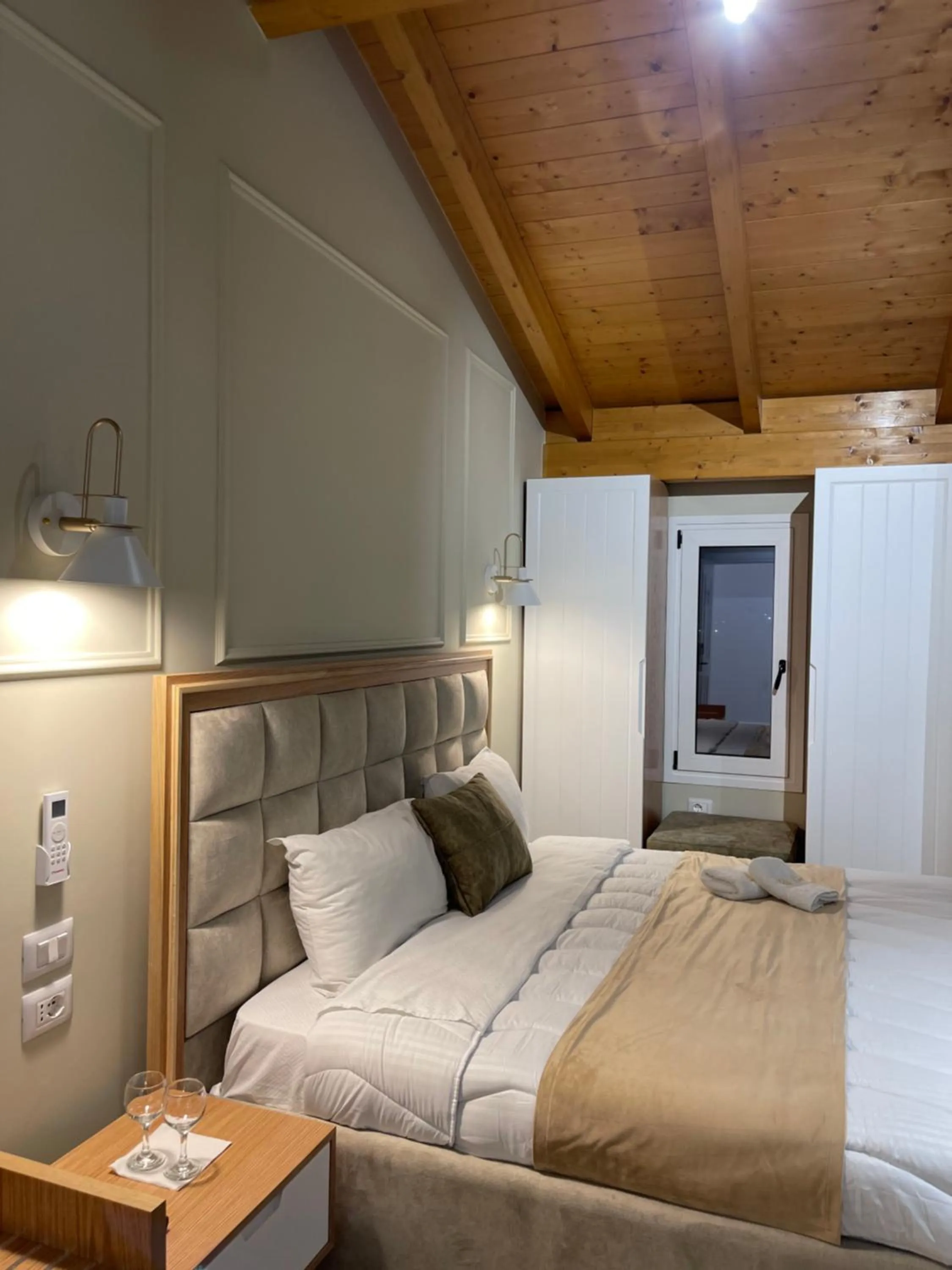 Bed in Arial Penthouse Suites