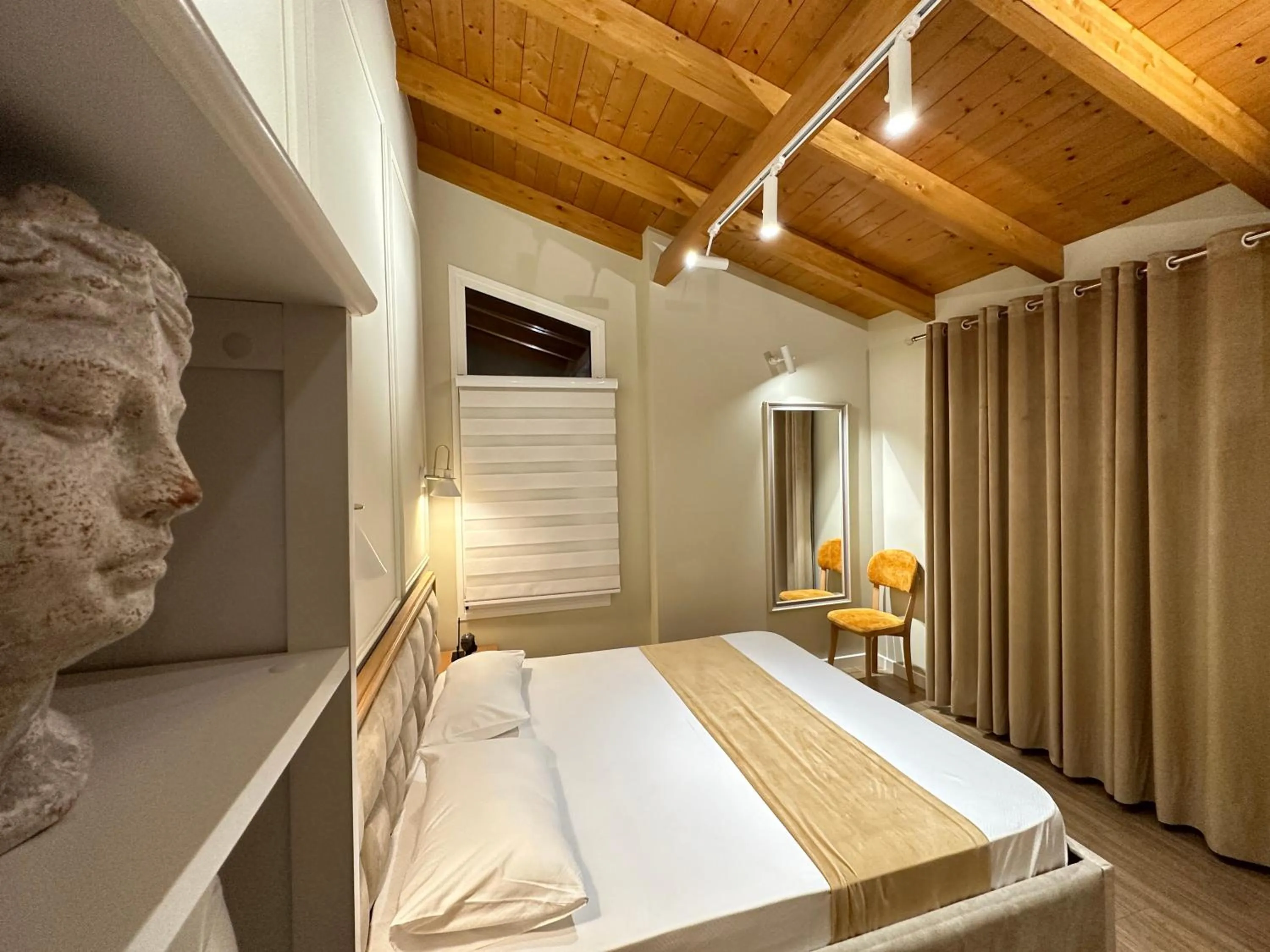 Bed in Arial Penthouse Suites