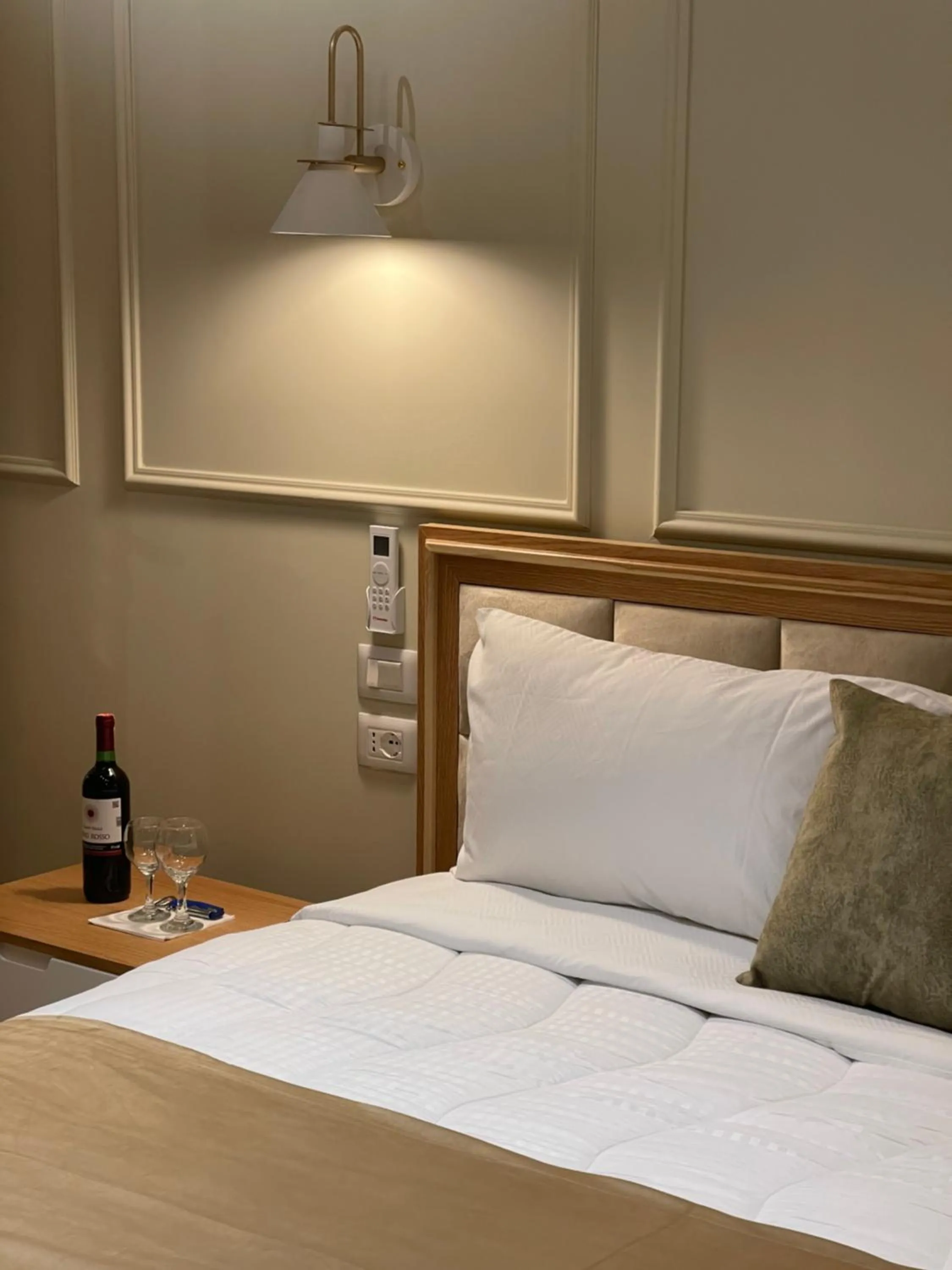 Bed in Arial Penthouse Suites