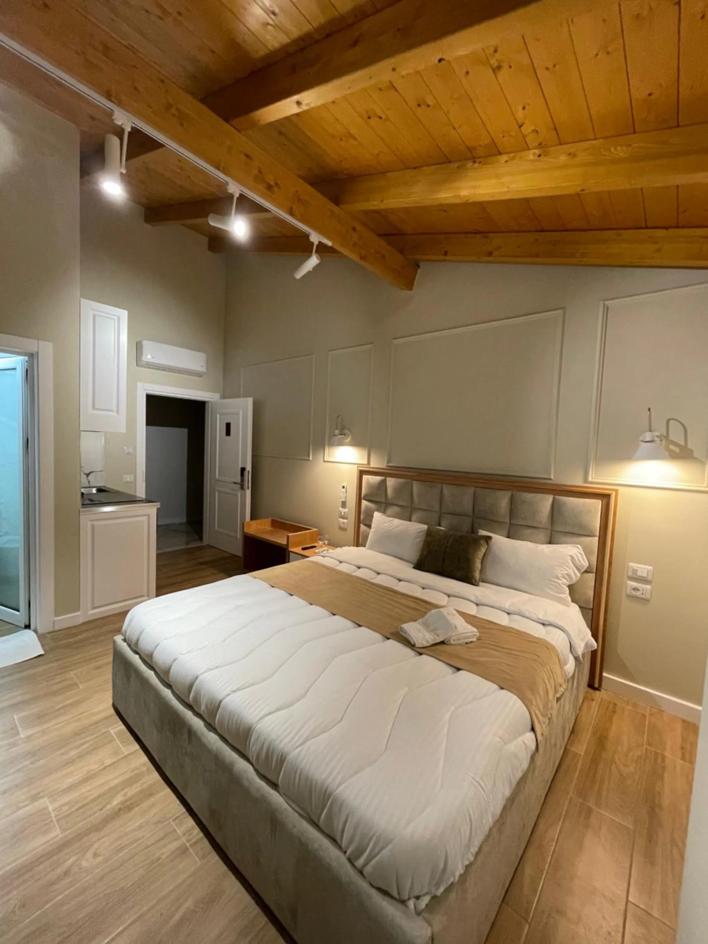 Bed in Arial Penthouse Suites