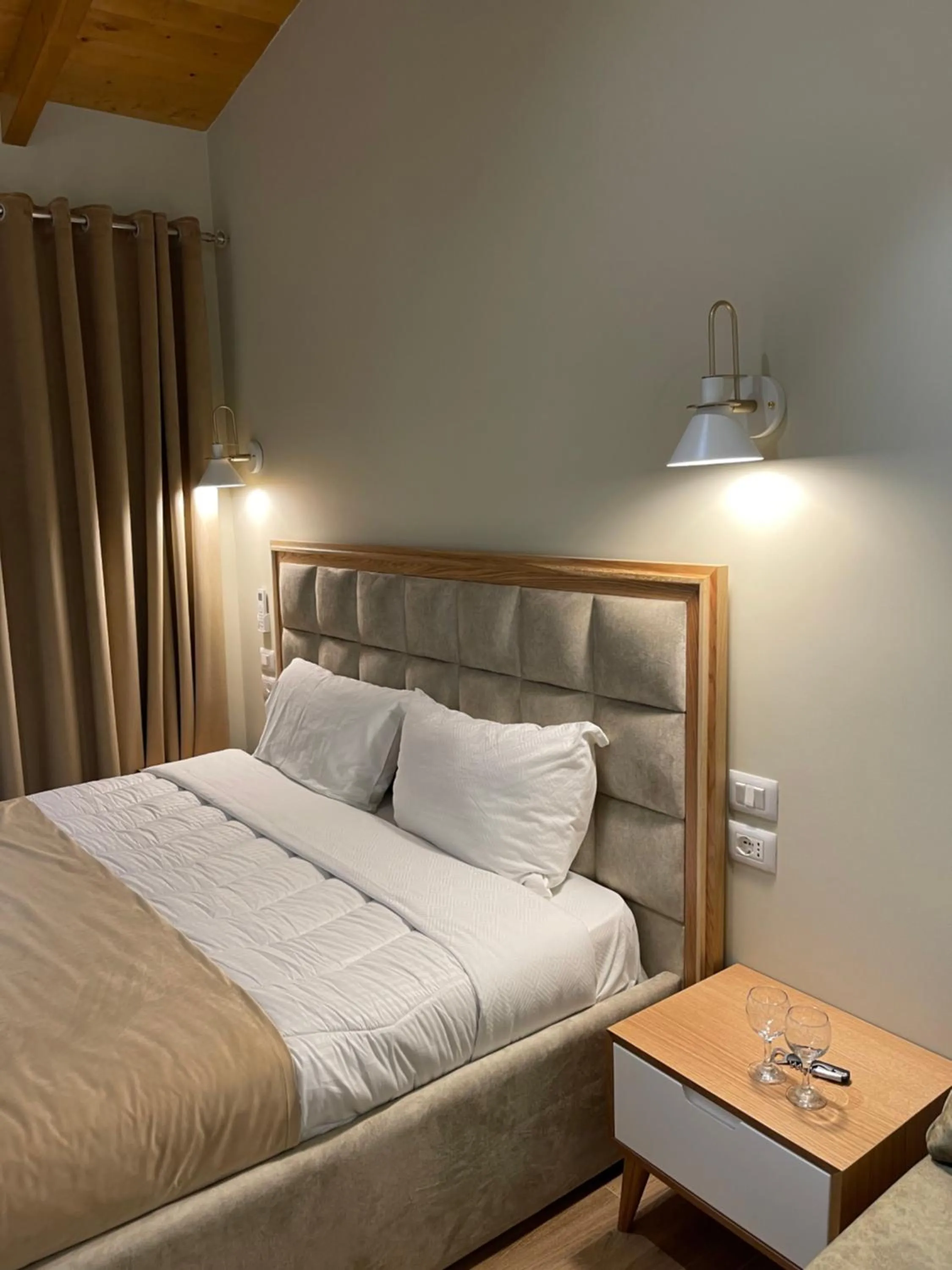 Bed in Arial Penthouse Suites