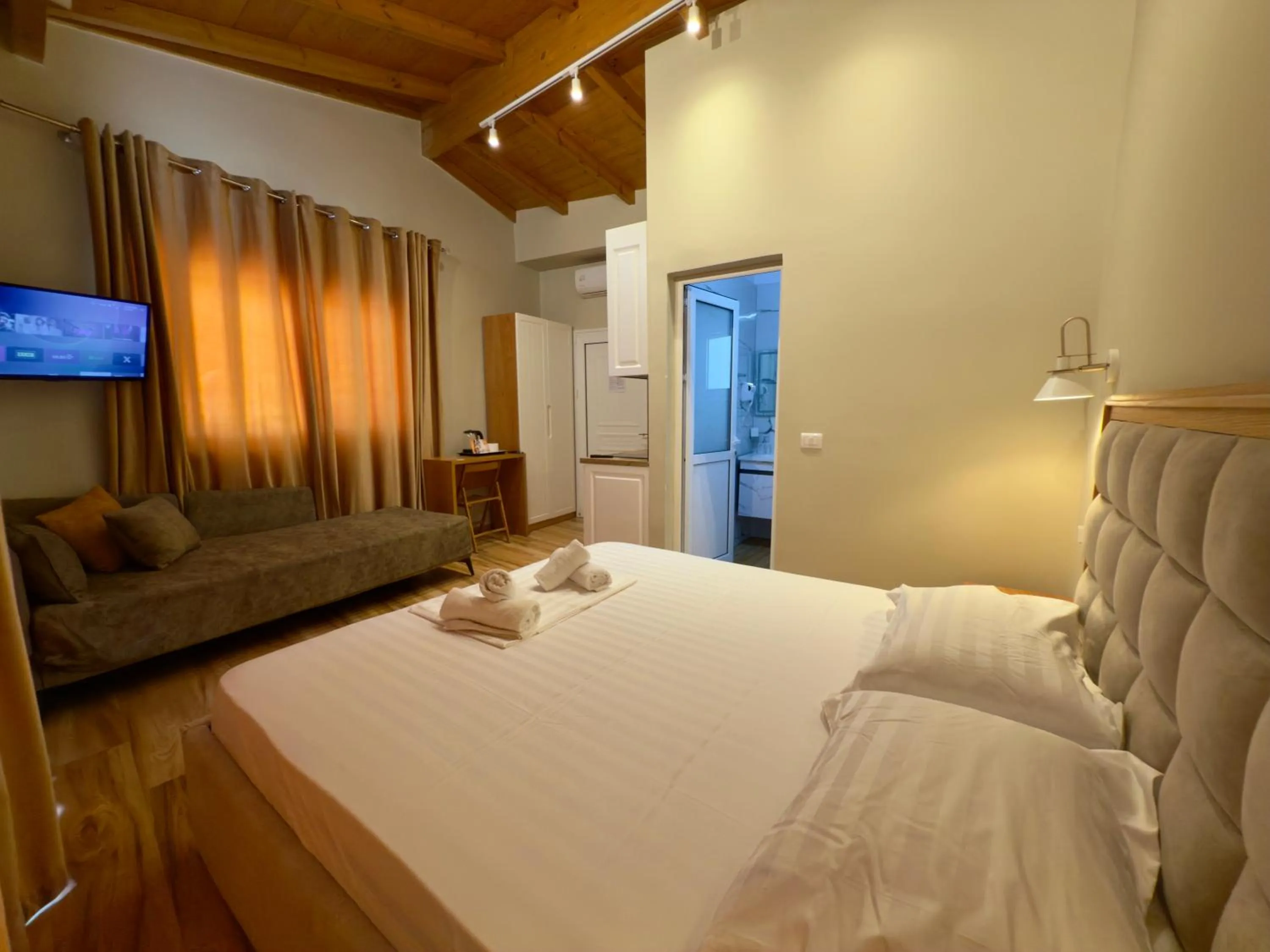 Bed in Arial Penthouse Suites