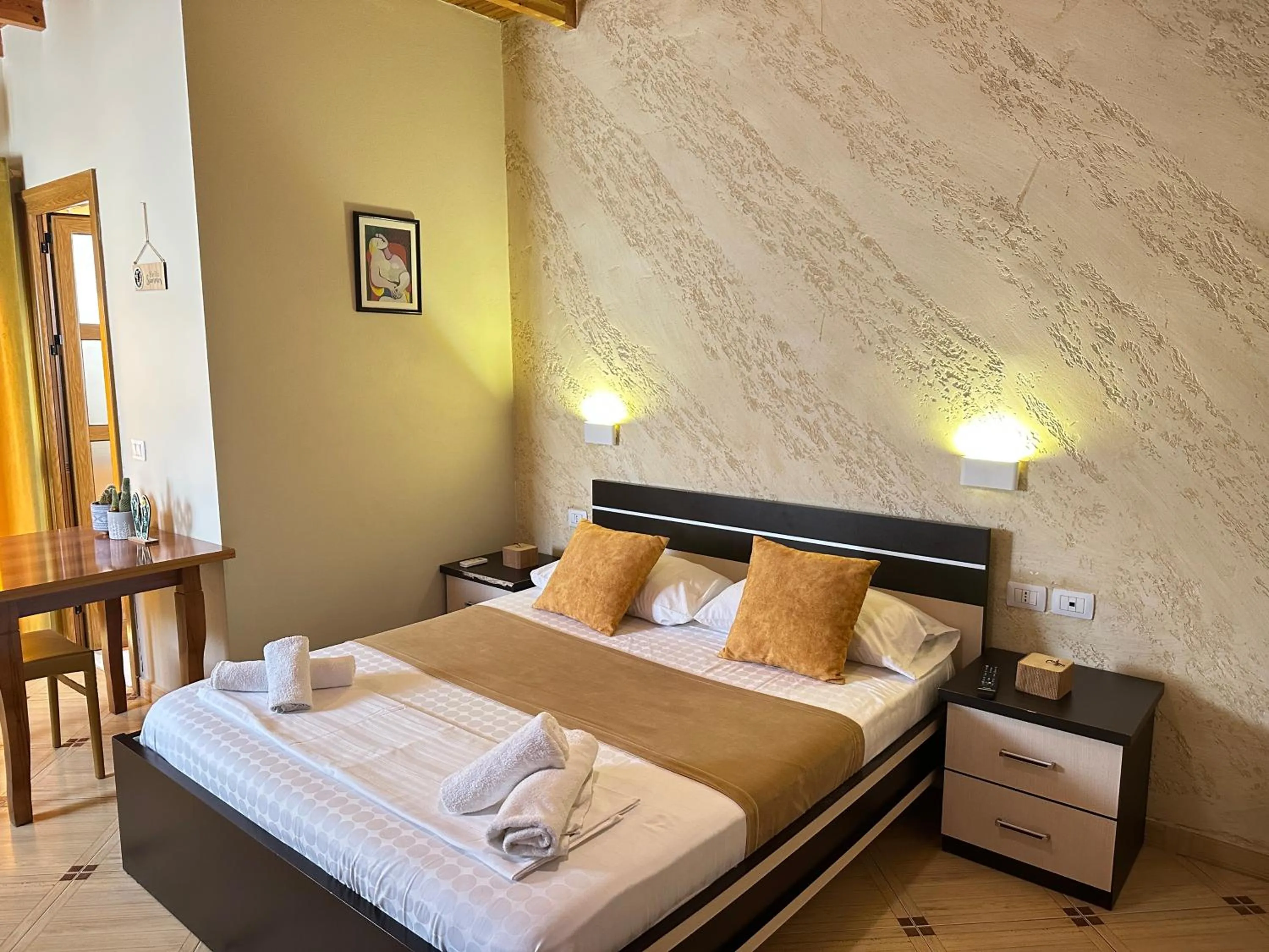 Bed in Arial Penthouse Suites