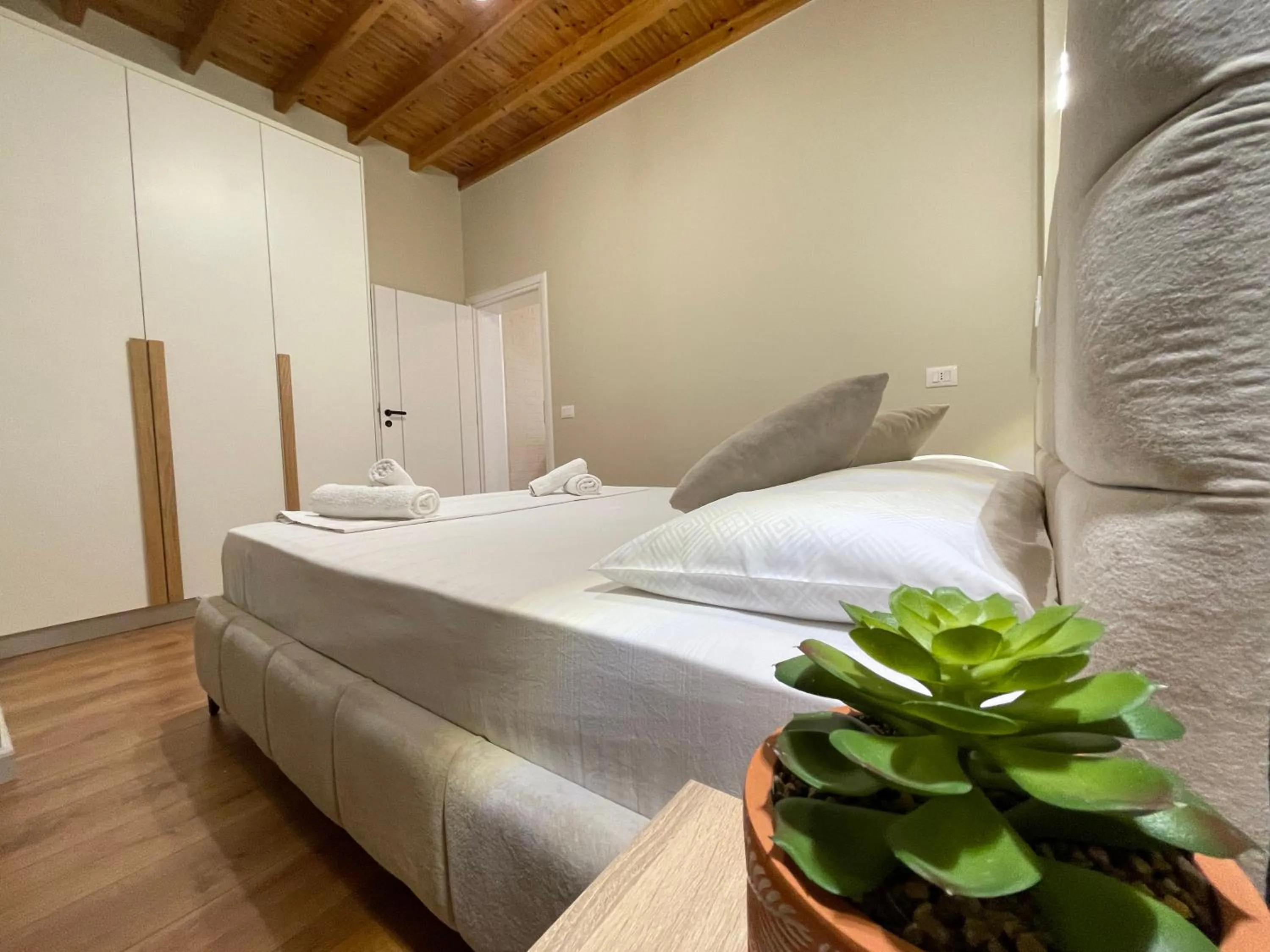 Bed in Arial Penthouse Suites