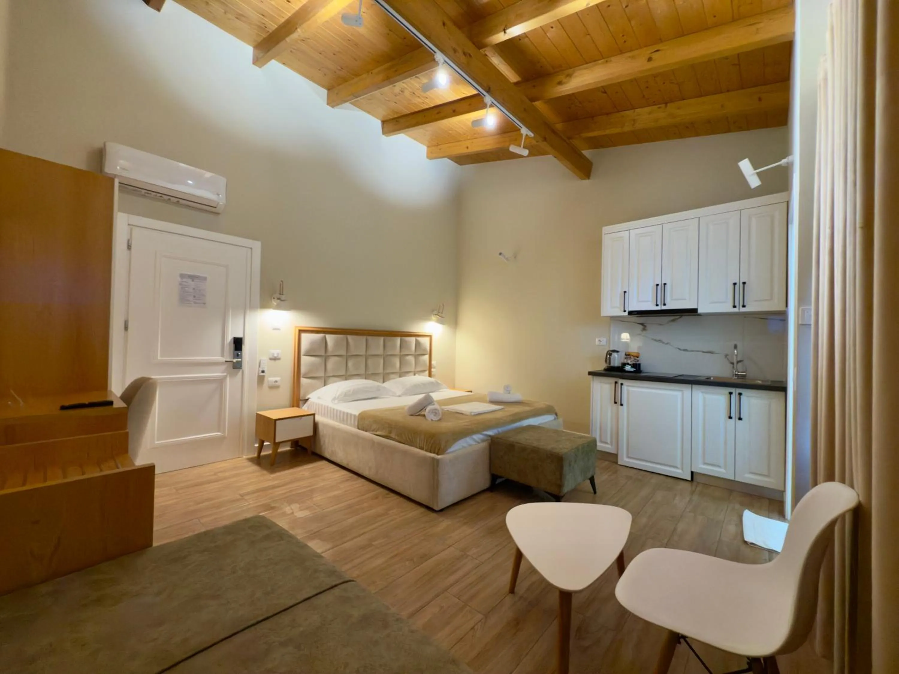 Bed in Arial Penthouse Suites