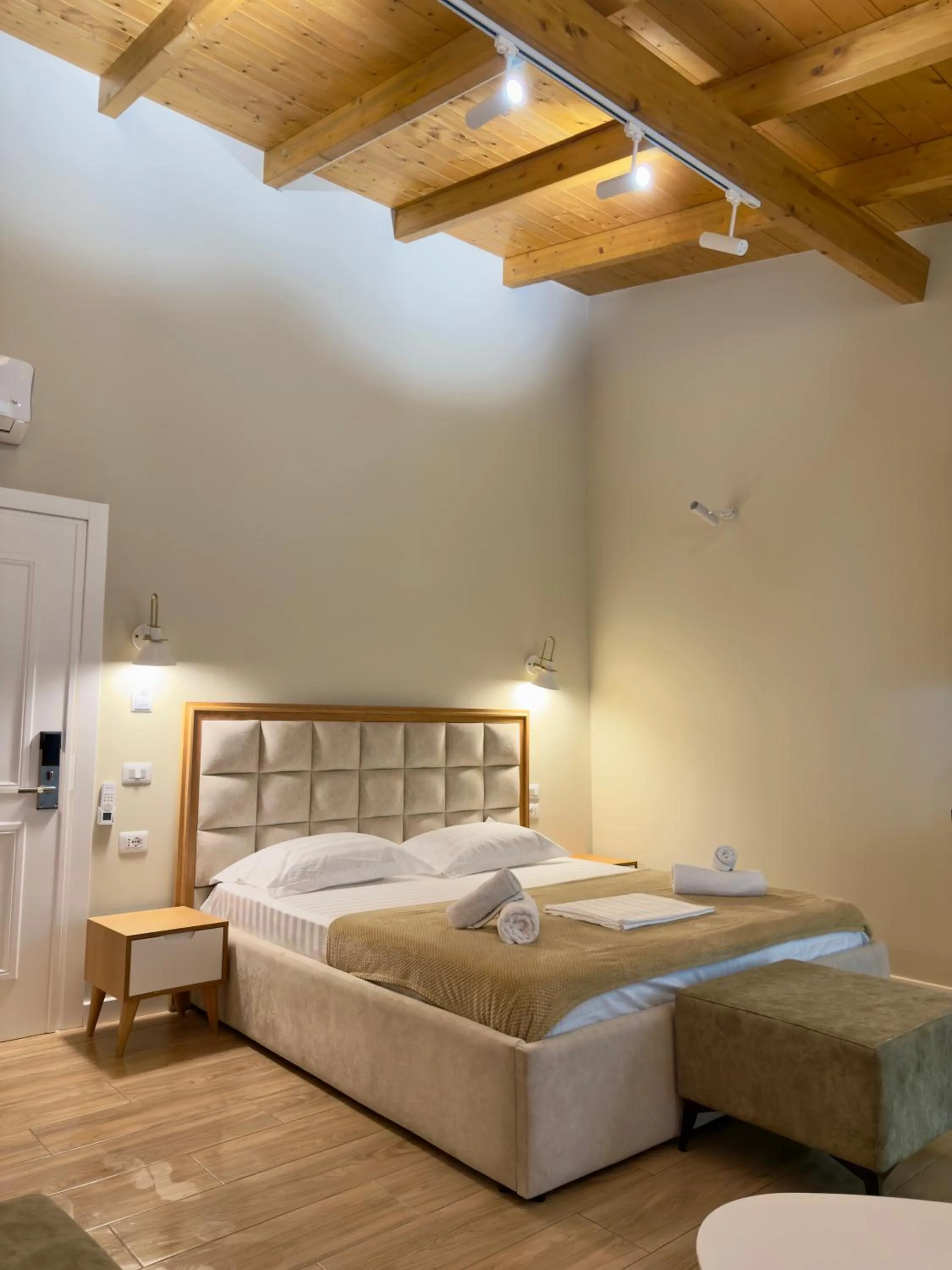 Bed in Arial Penthouse Suites