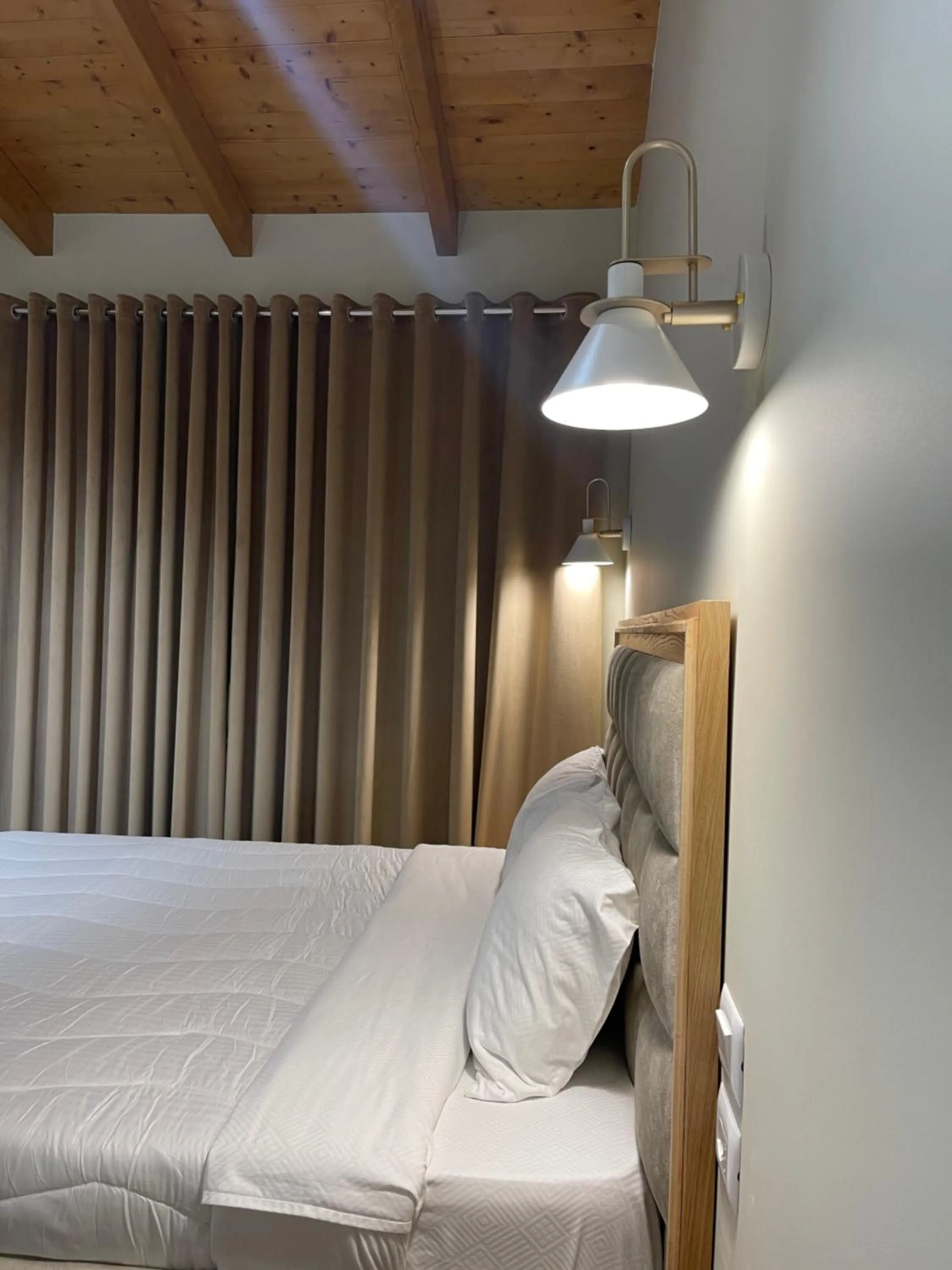 Bed in Arial Penthouse Suites