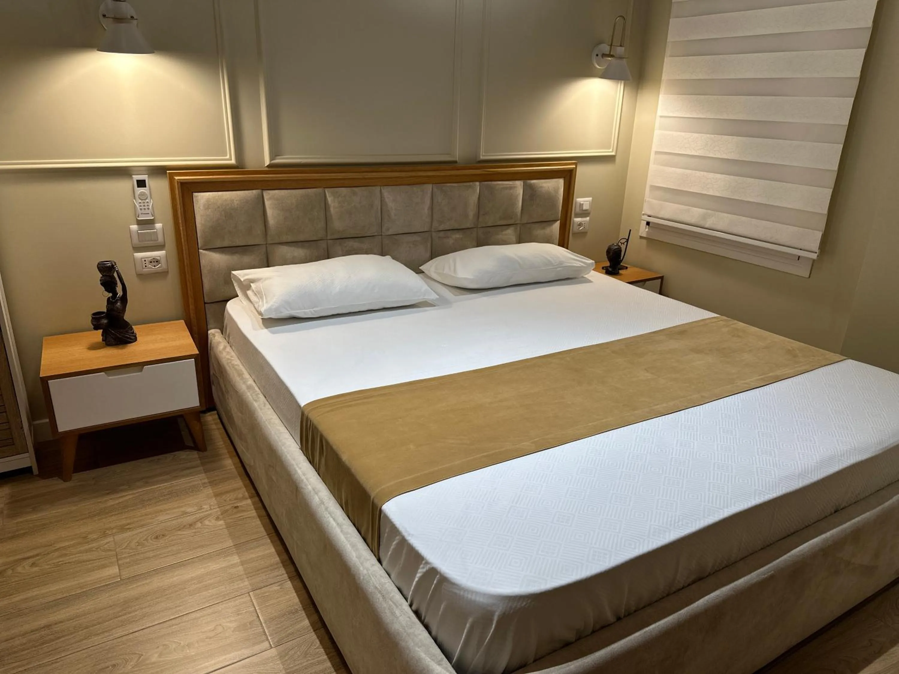 Bed in Arial Penthouse Suites