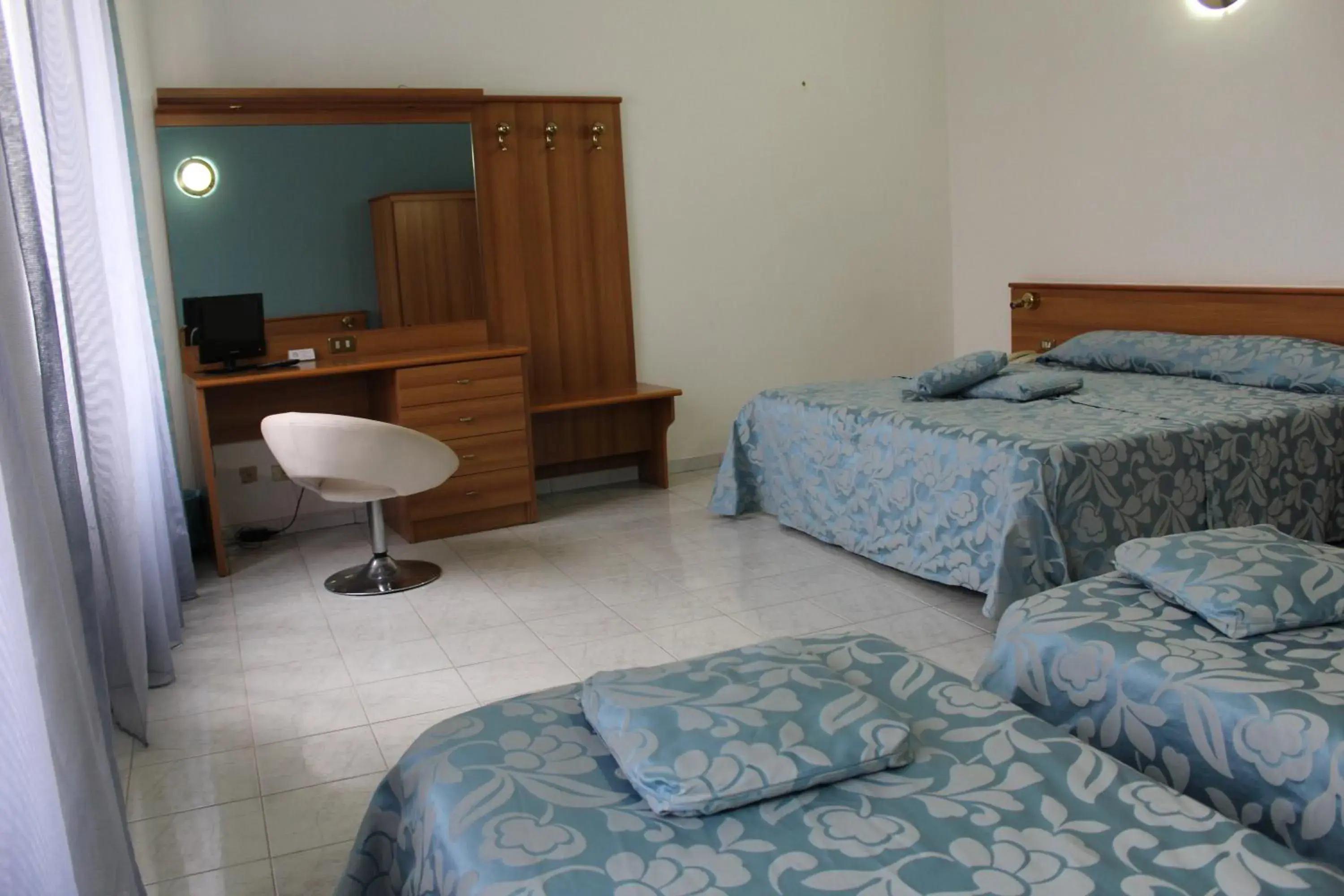 Triple Room in Hotel Santa Marta Triple Room in Hotel Santa Marta