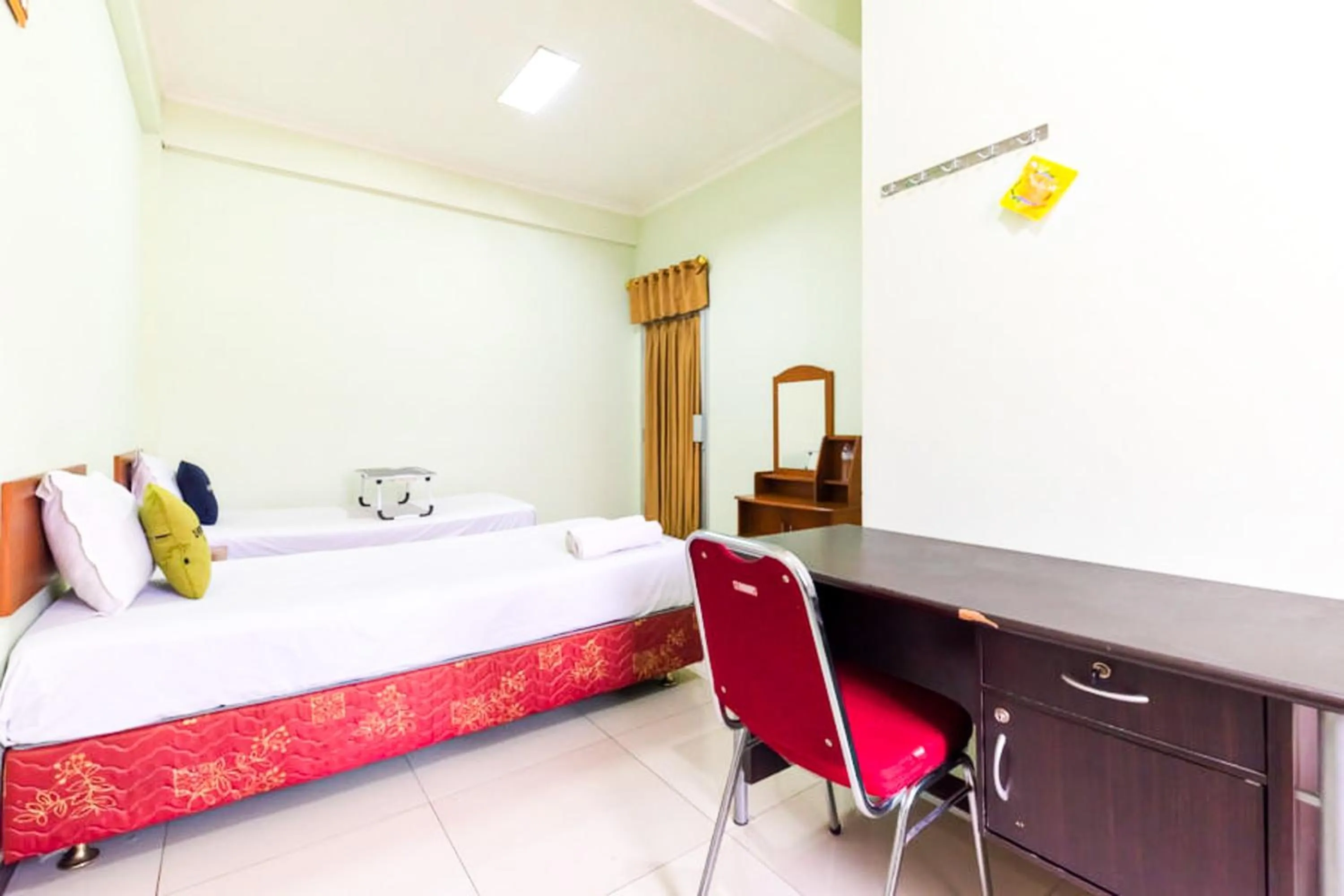 Bedroom, Bed in Urbanview Hotel Bartu Moh Toha Bandung by RedDoorz