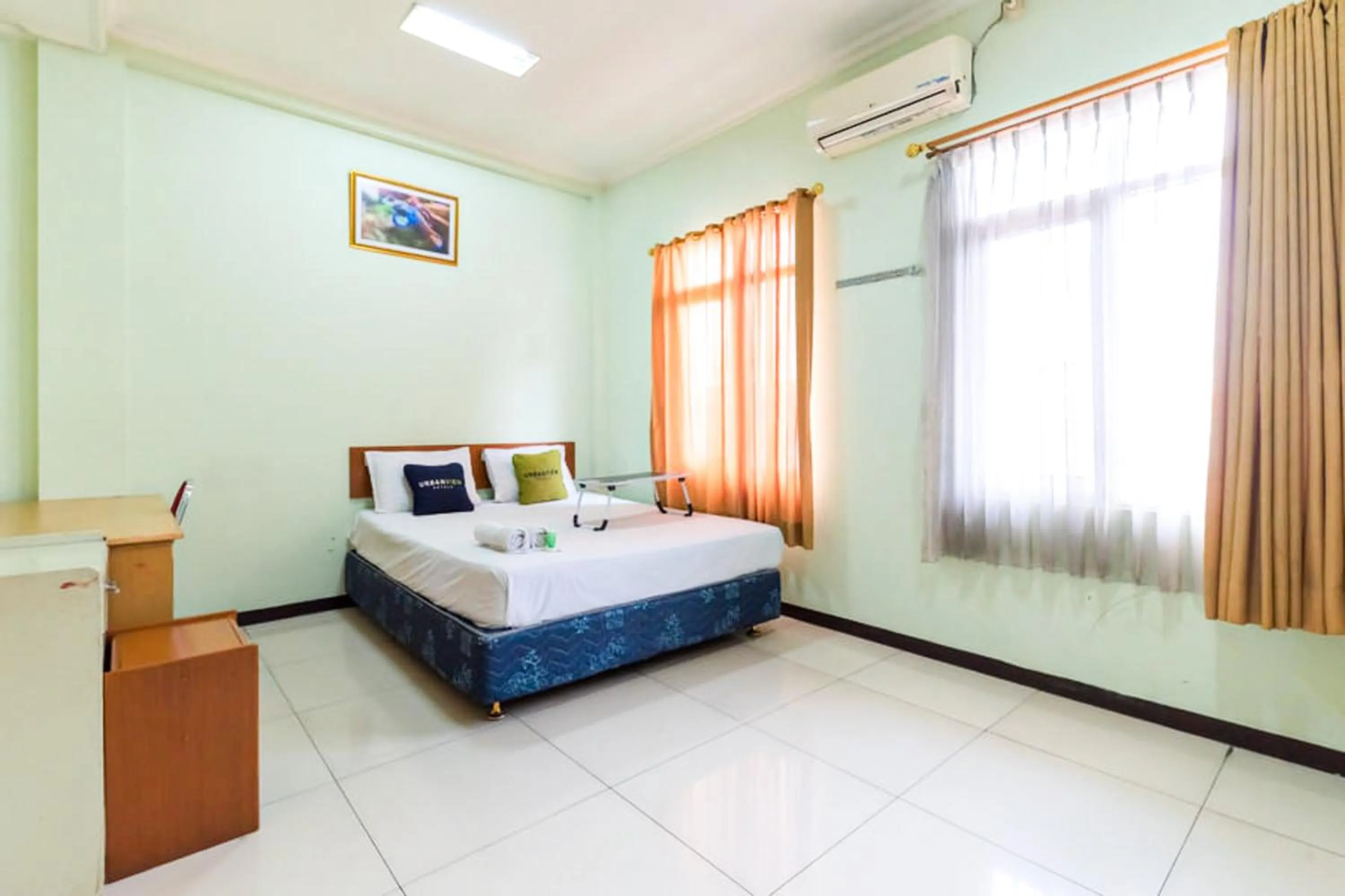 Bedroom, Bed in Urbanview Hotel Bartu Moh Toha Bandung by RedDoorz