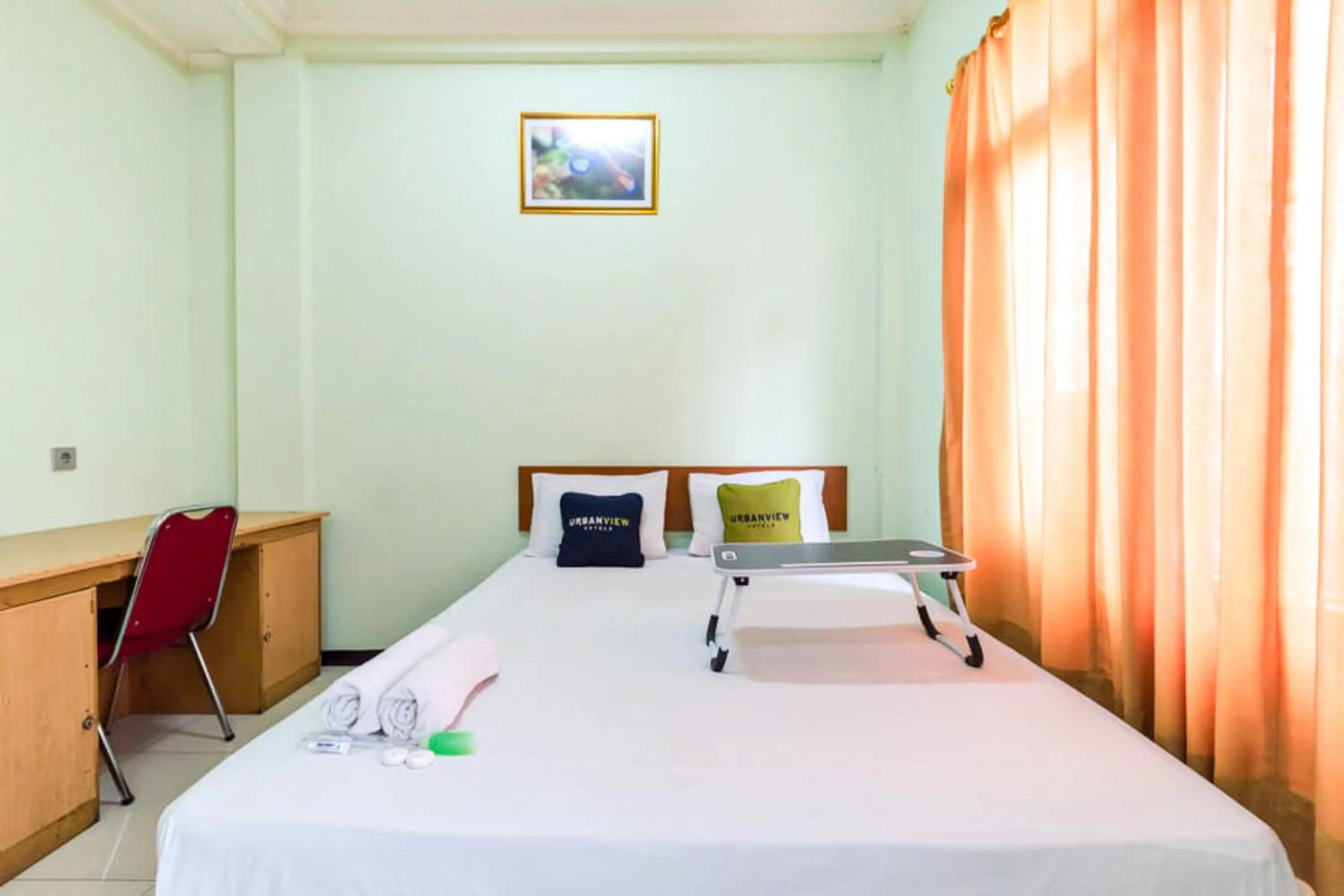 Bedroom, Bed in Urbanview Hotel Bartu Moh Toha Bandung by RedDoorz