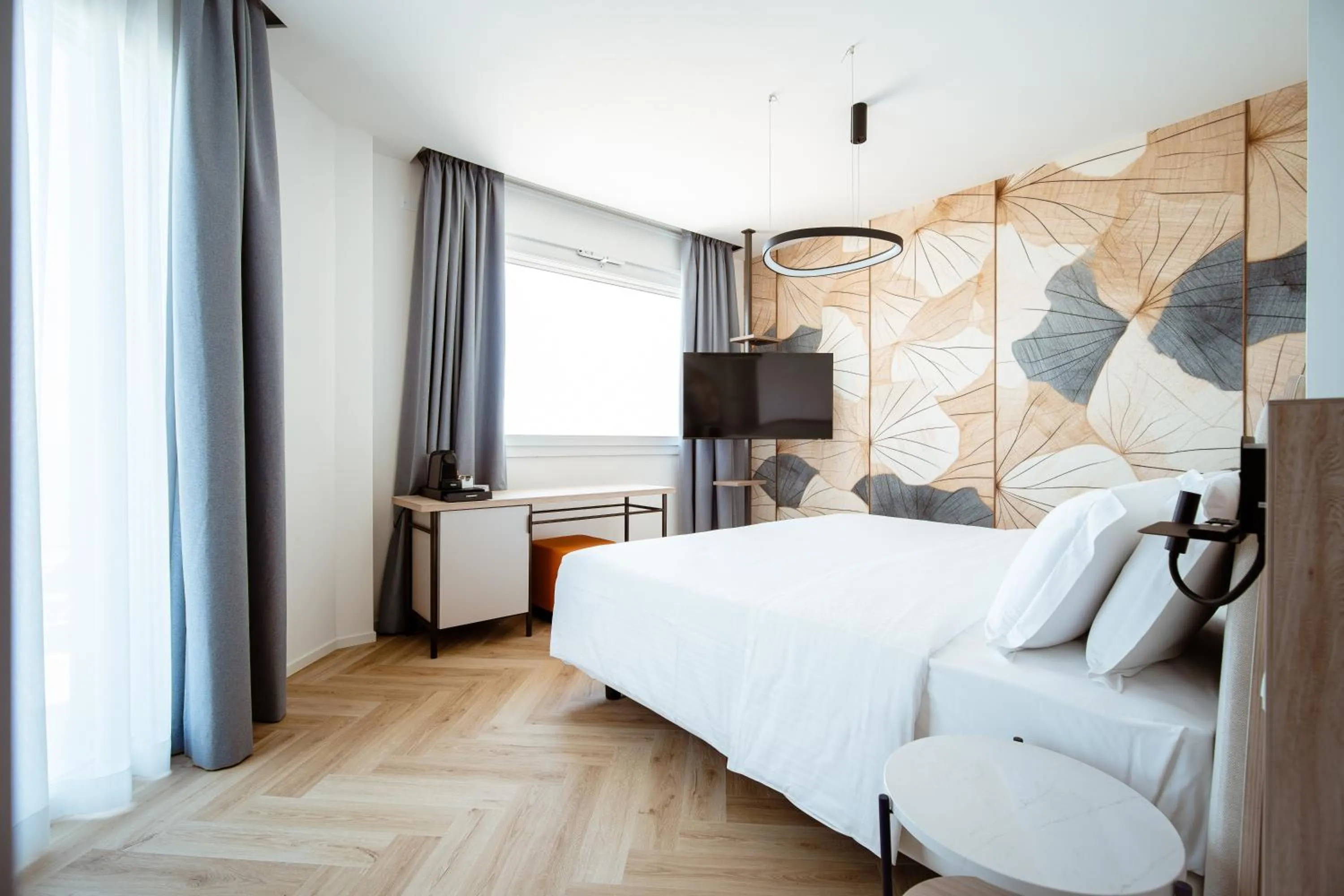 Bed in Hotel Cavalieri Palace & Suites