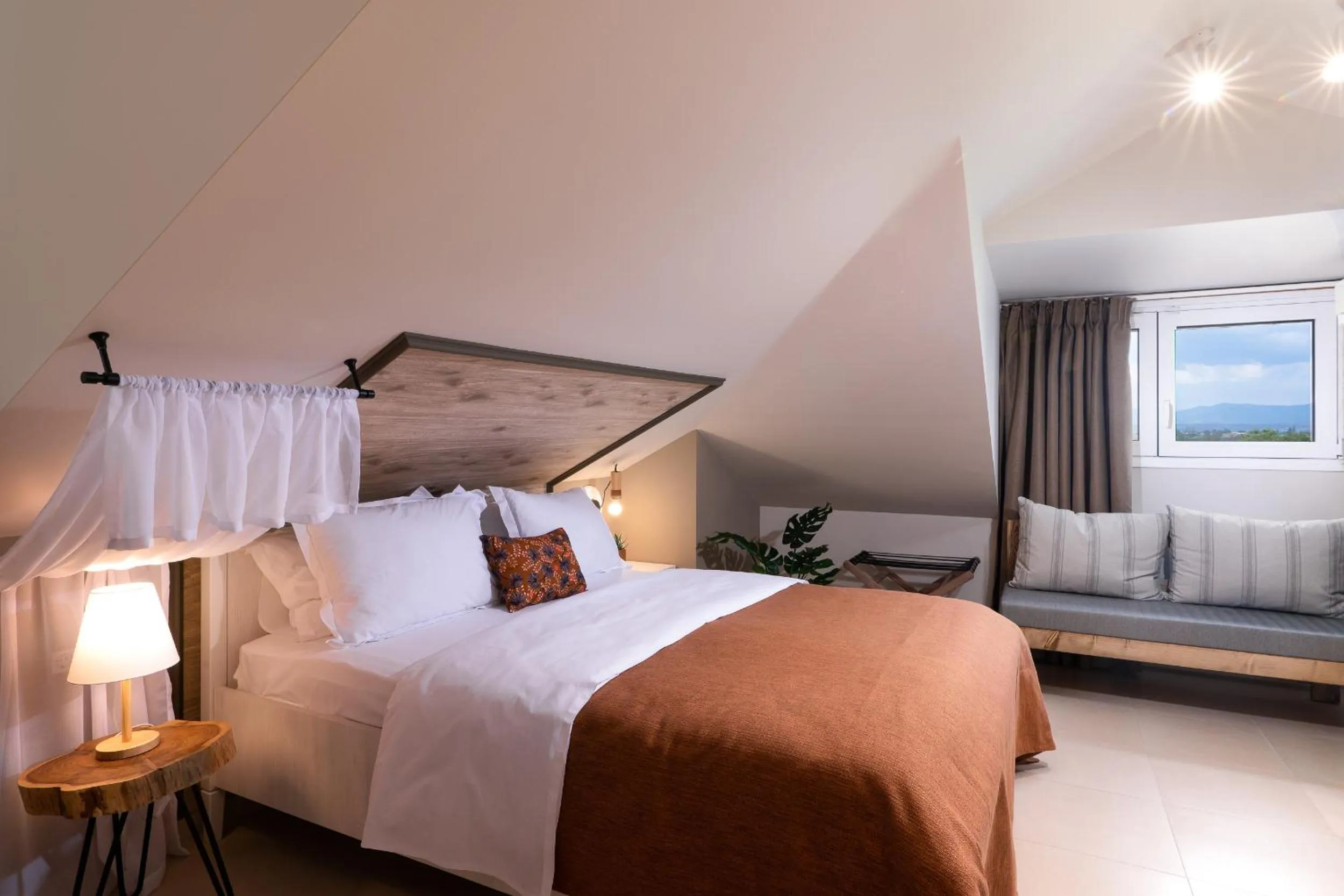 Bed in ELLE Rooms & Suites