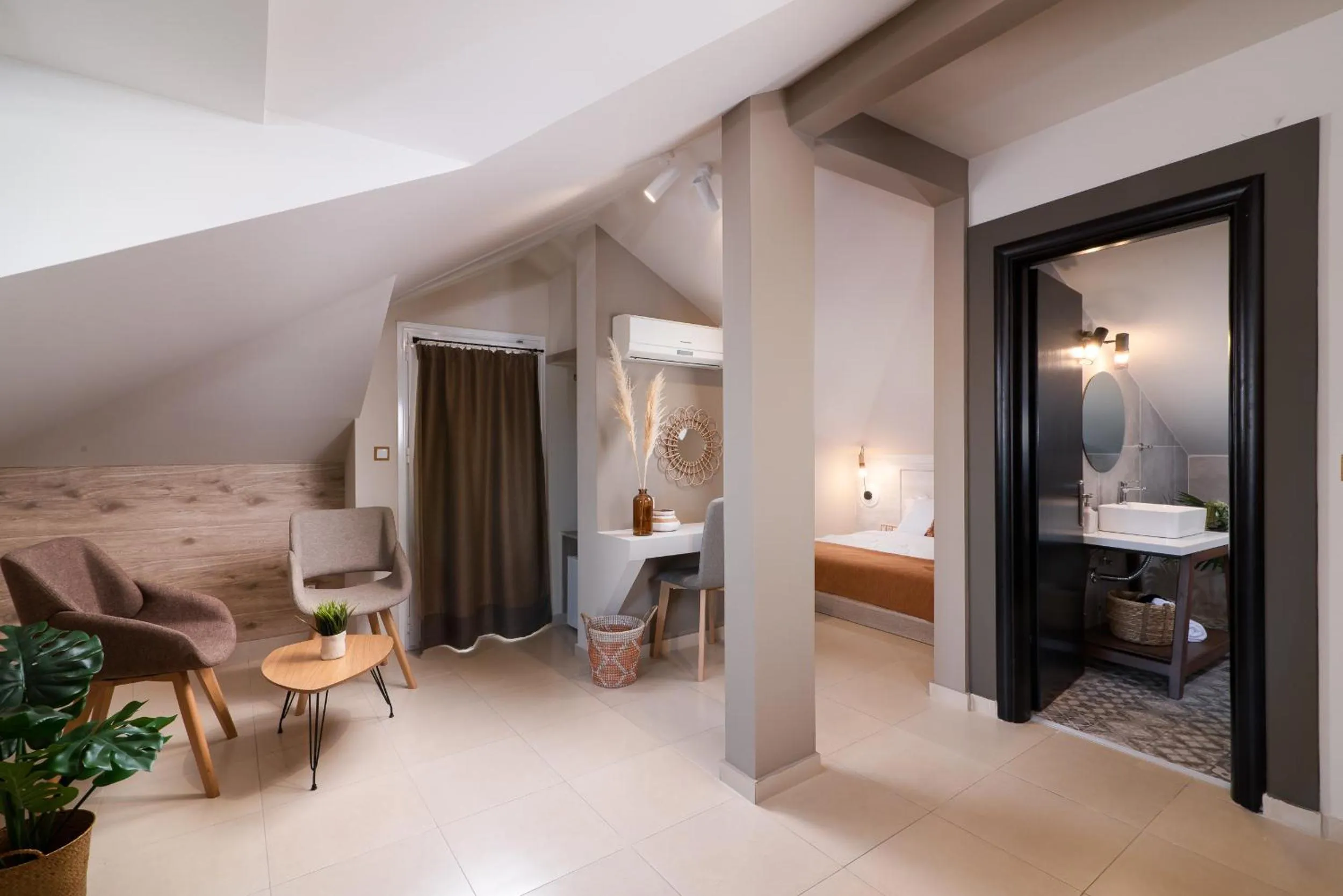 Bed in ELLE Rooms & Suites