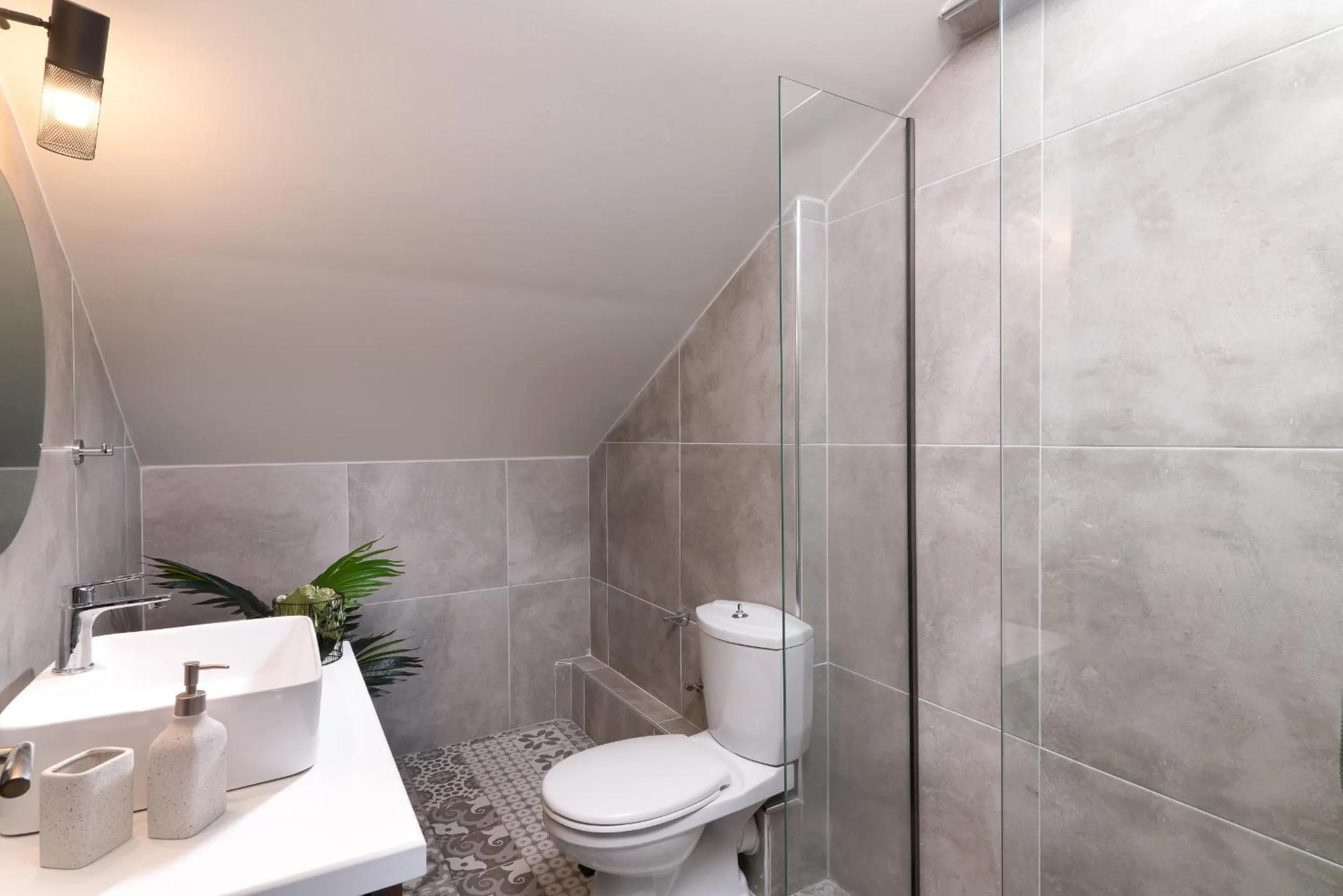 Shower in ELLE Rooms & Suites