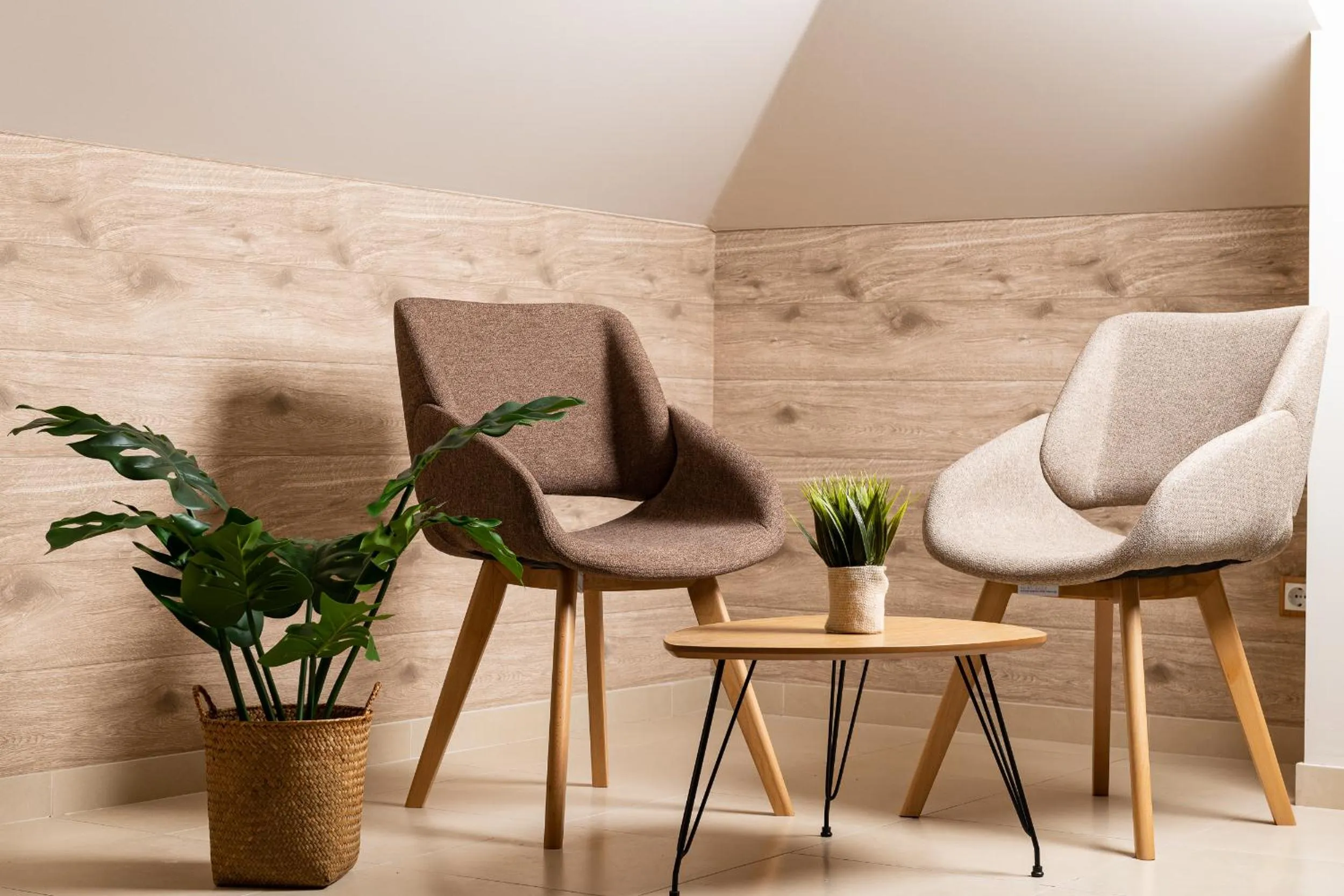 Seating area in ELLE Rooms & Suites