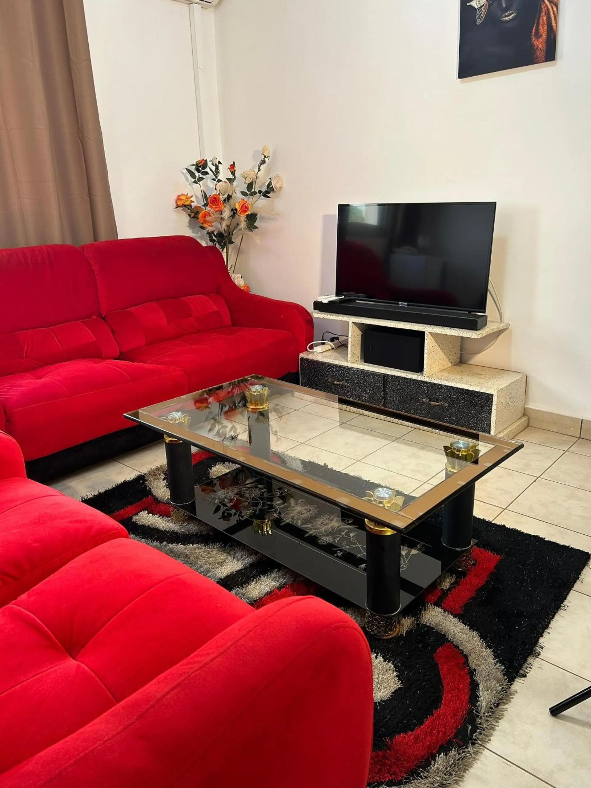 Communal lounge/ TV room in Prodiges Hôtel