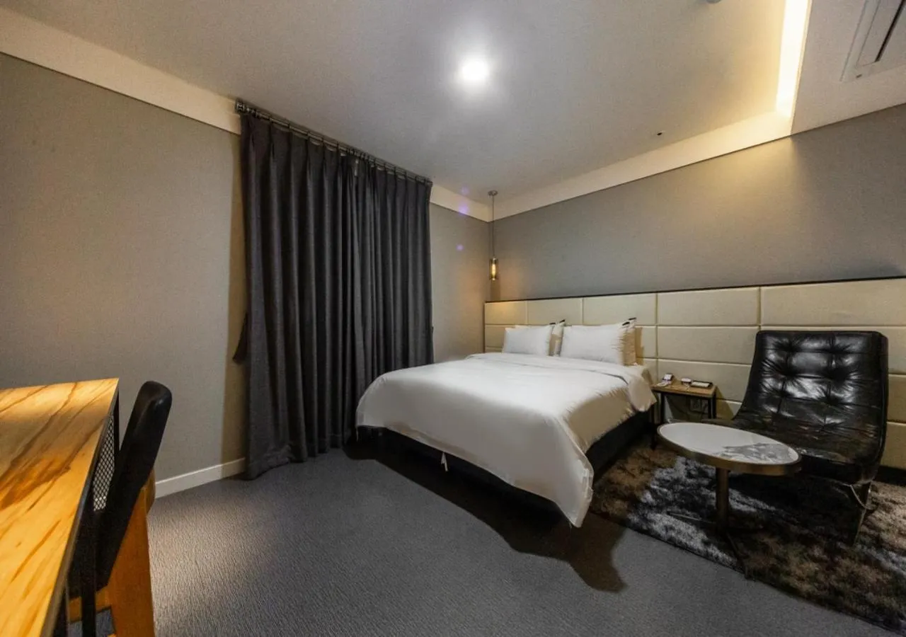 Photo of the whole room, Bed in West In Hotel Yeosu