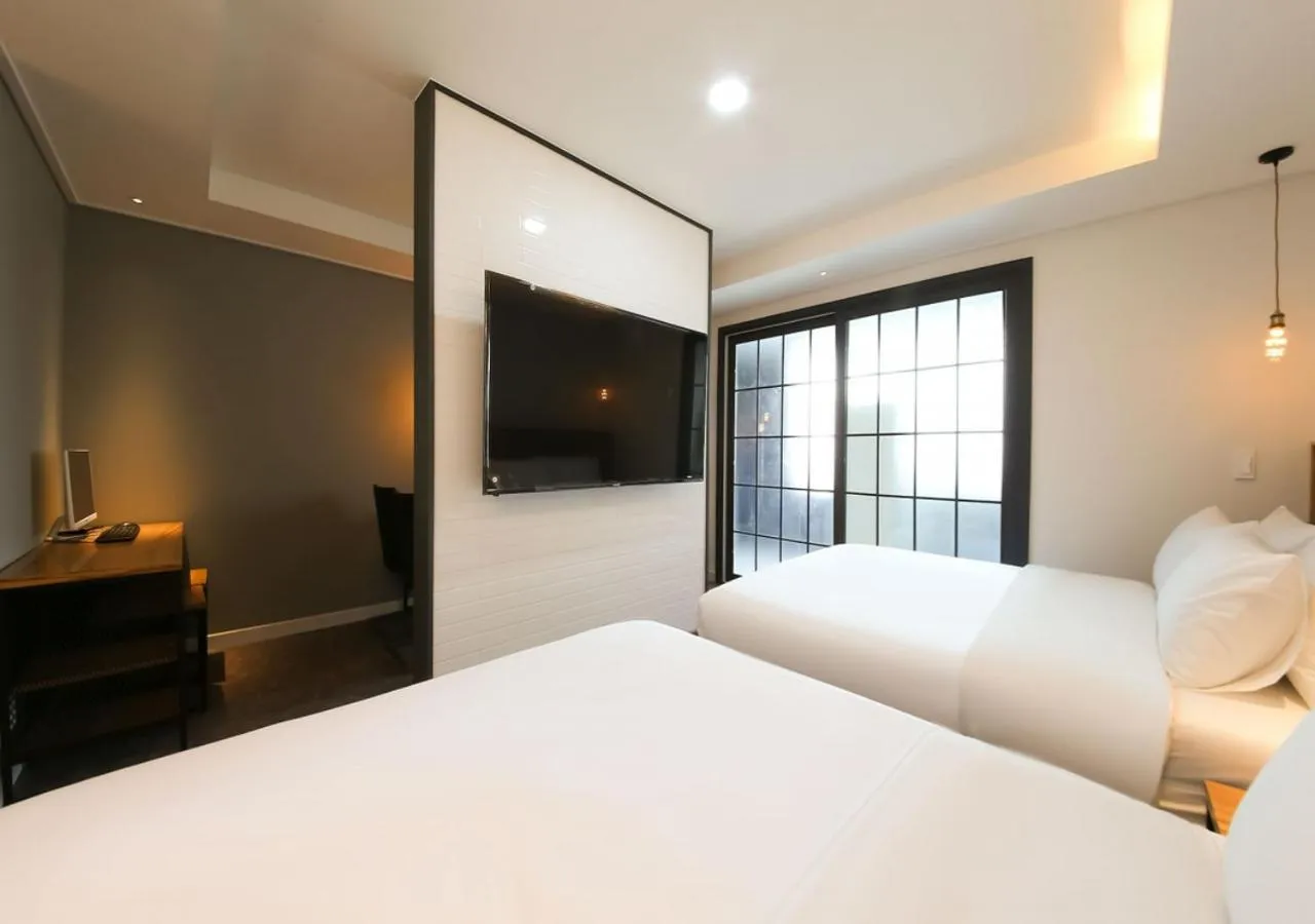Bed in West In Hotel Yeosu