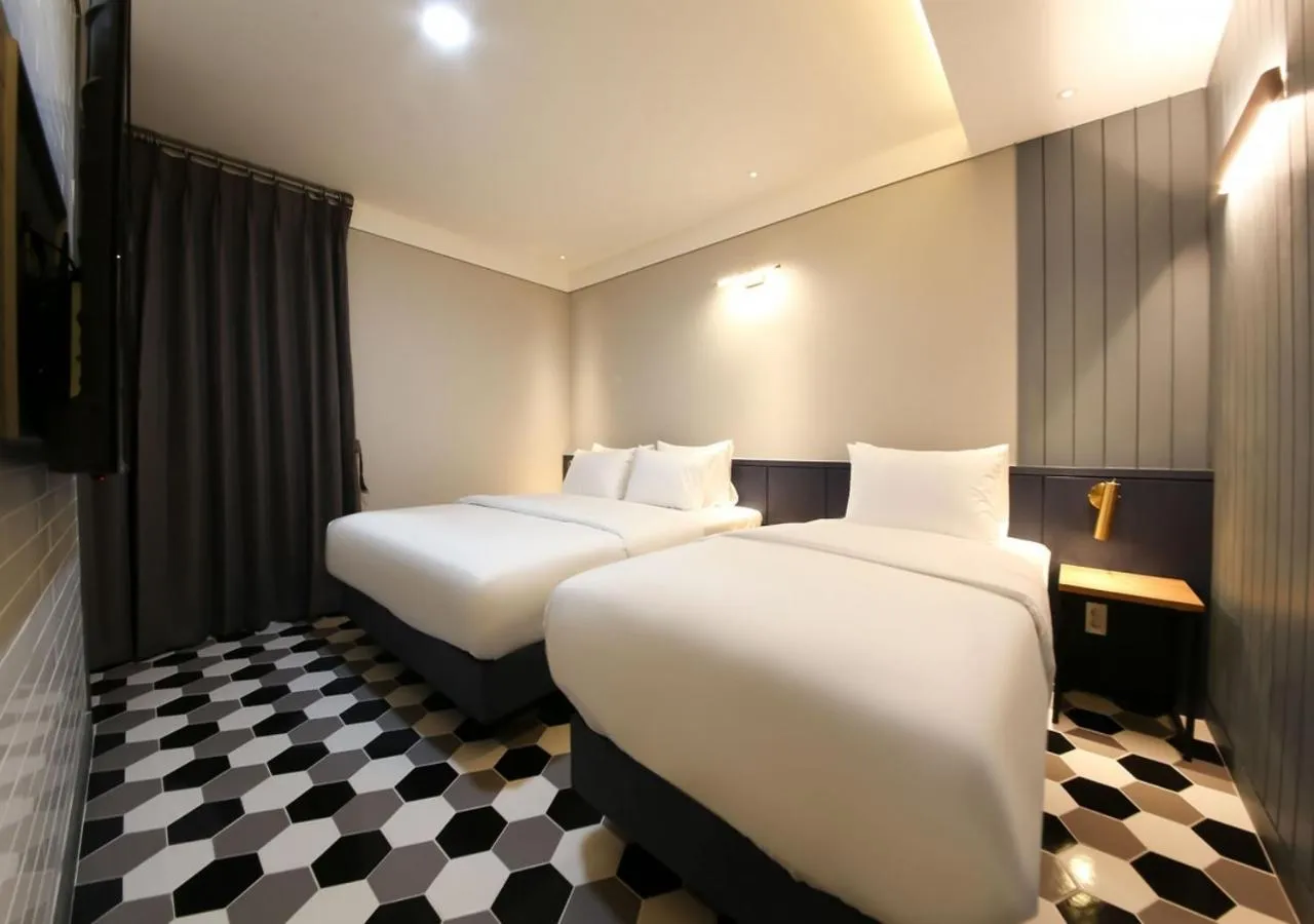 Bed in West In Hotel Yeosu