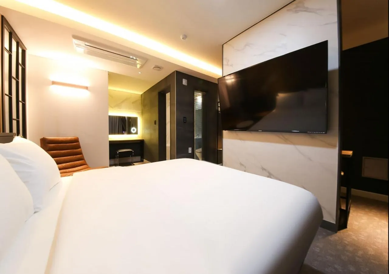 Photo of the whole room, Bed in West In Hotel Yeosu