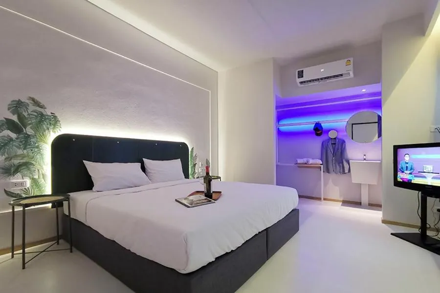 Photo of the whole room, Bed in INNLUXPHUKET