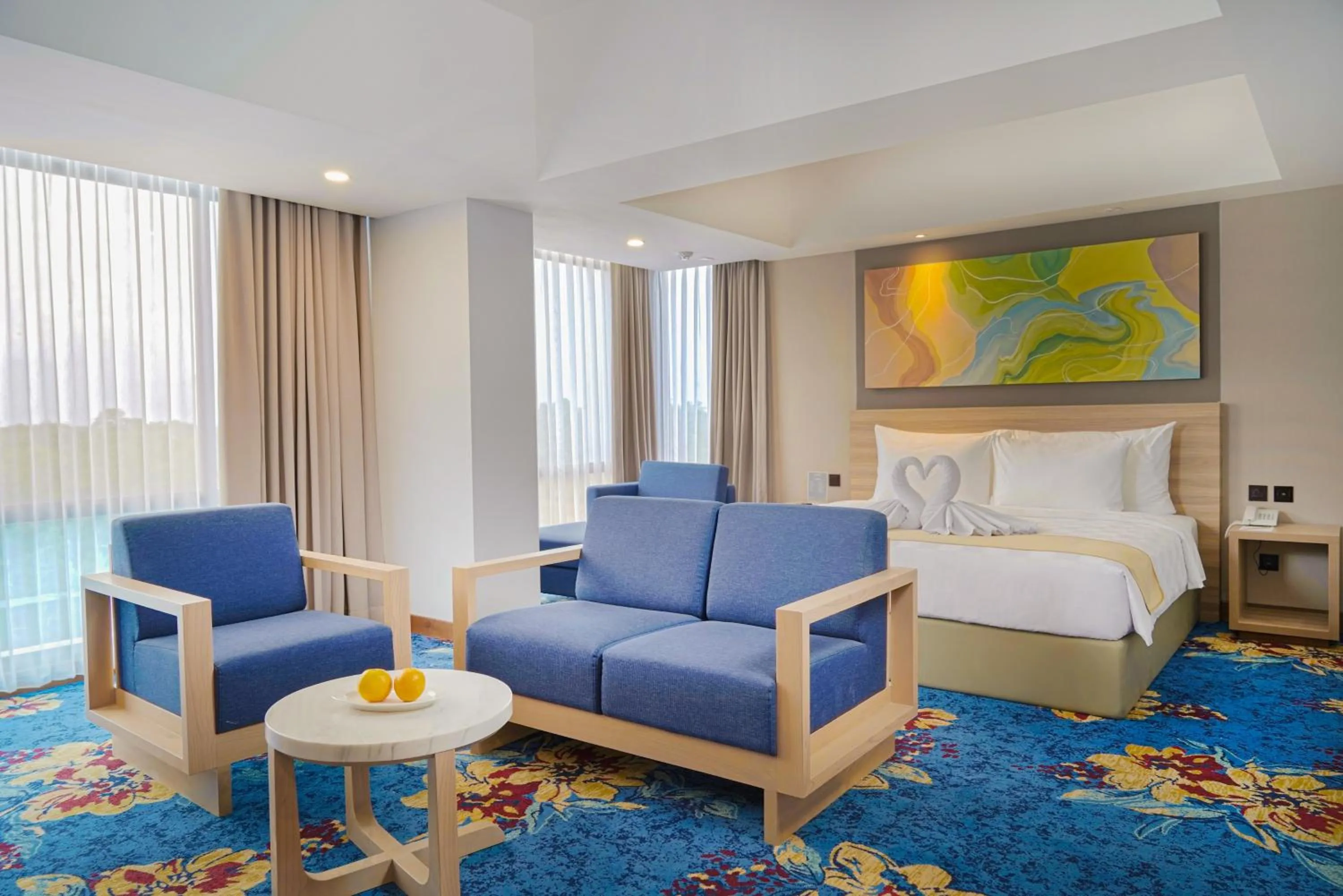 Seating area, Bed in Hotel Metland Smara Kertajati