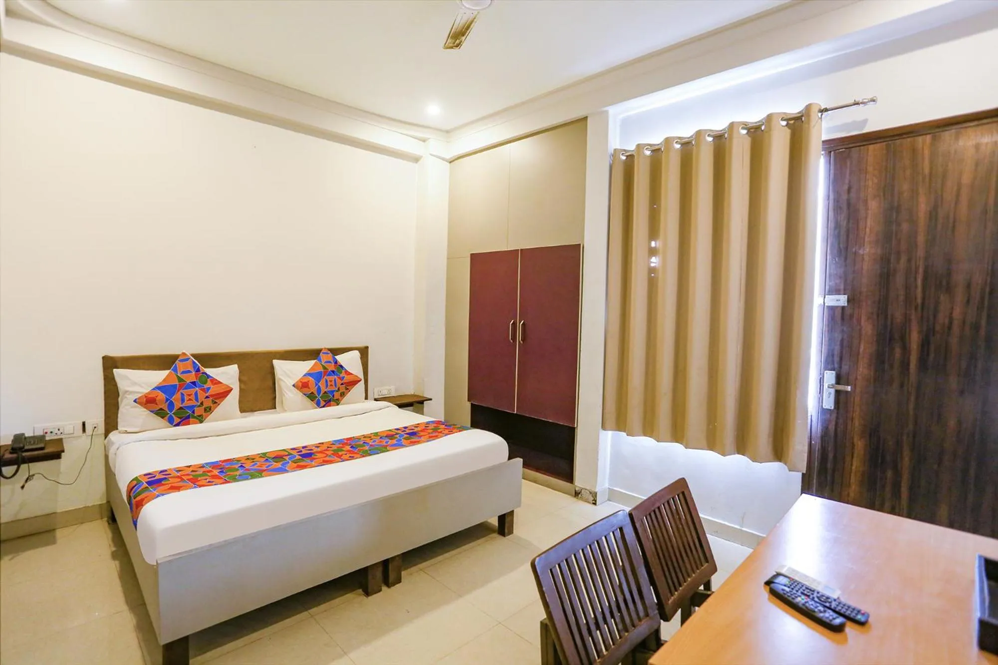 Living room, Bed in FabExpress Novel Suites - Nr Yashobhoomi Convention Centre