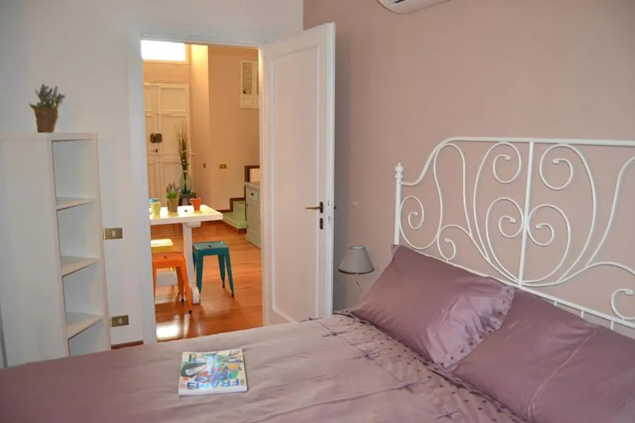 Bed in Palazzo Velli Suites