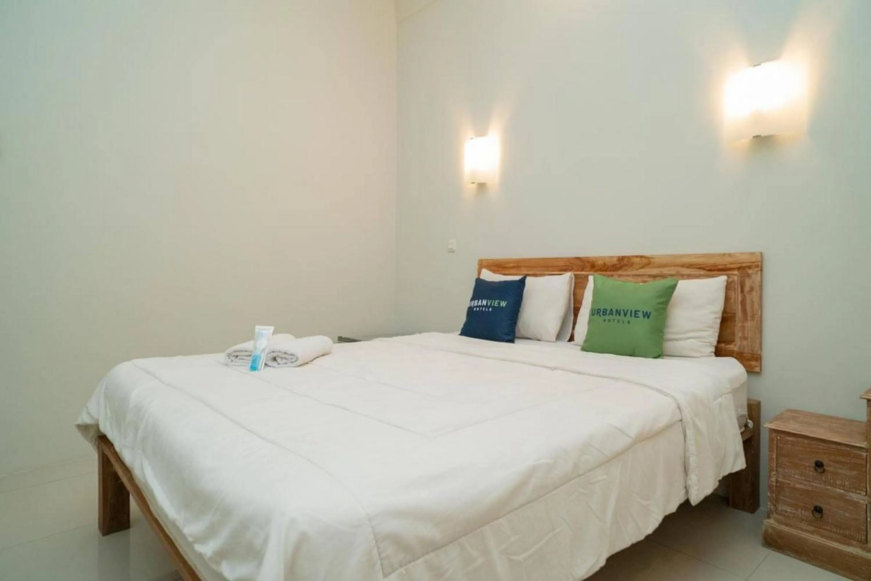 Bedroom, Bed in Urbanview Hotel Wayan Mansion