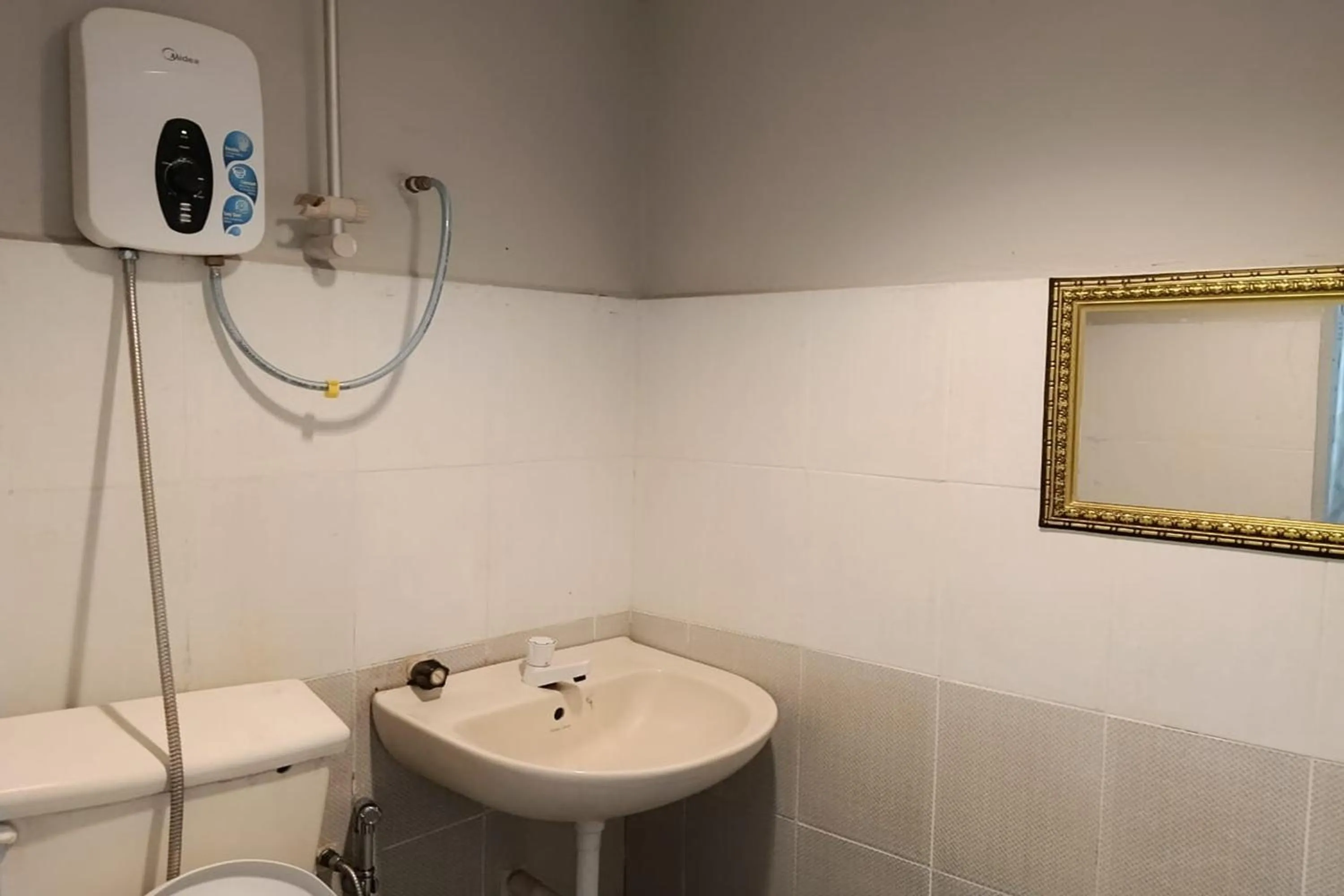 Toilet in Persona Boutique Hotel