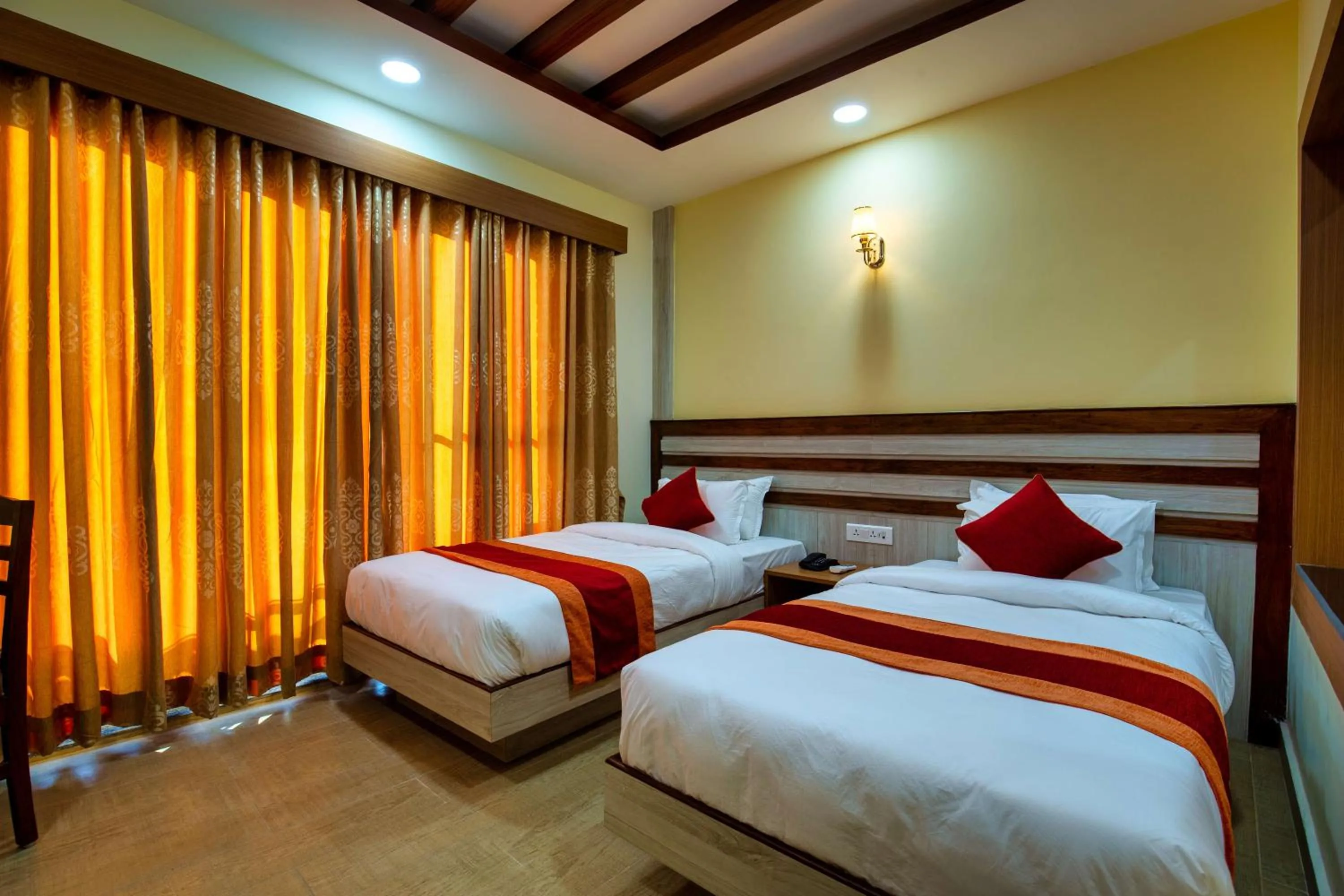 Bed in Chitwan Midtown Hotel