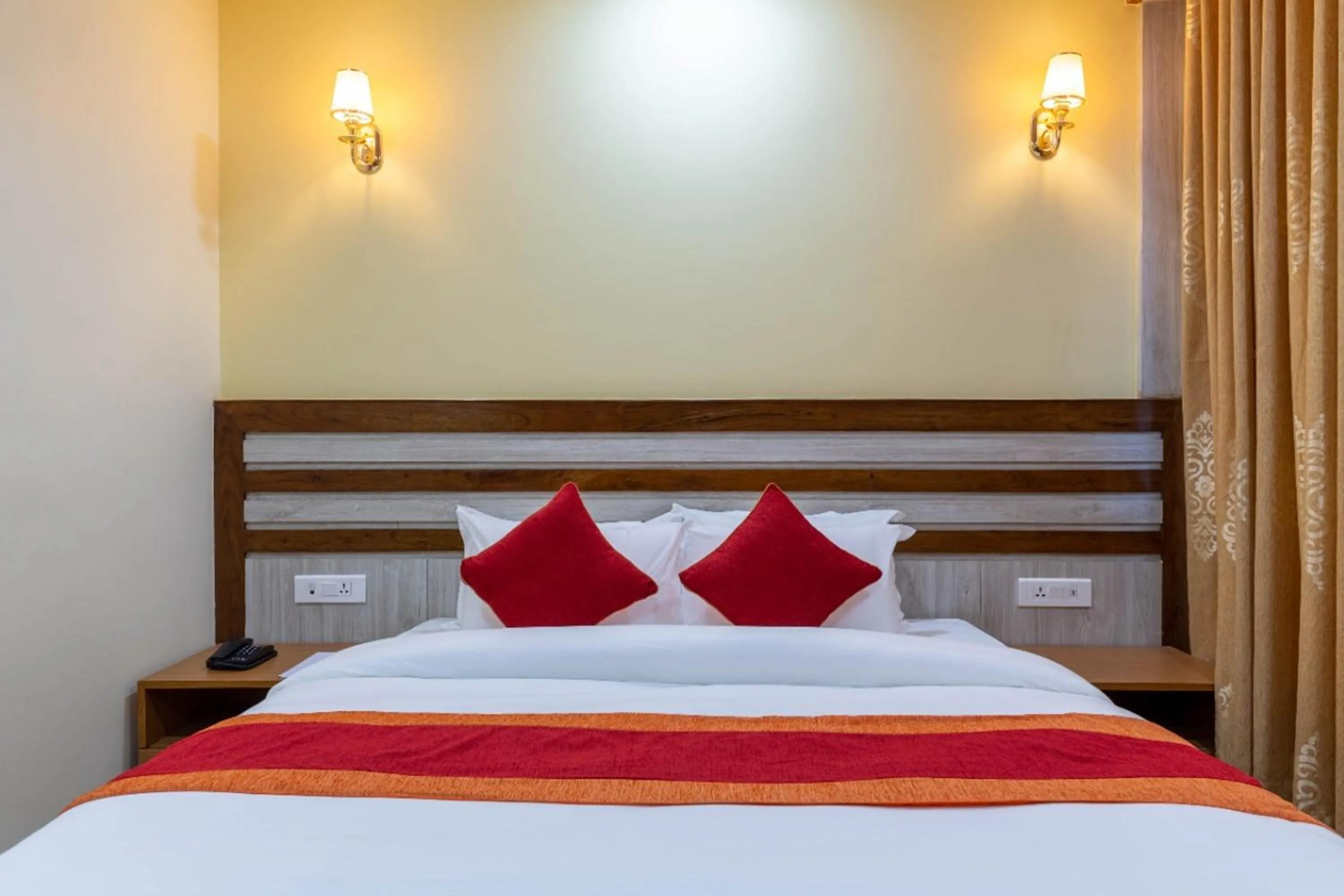 Bed in Chitwan Midtown Hotel