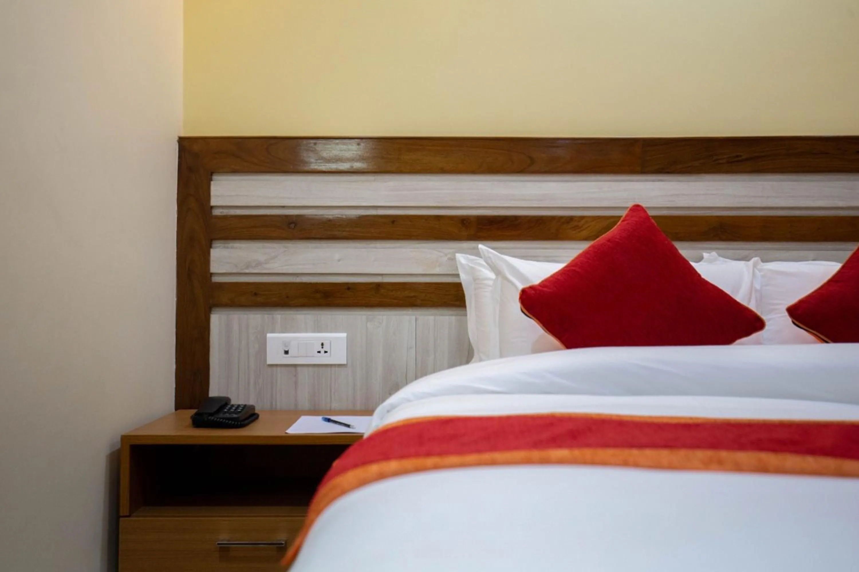Bed in Chitwan Midtown Hotel