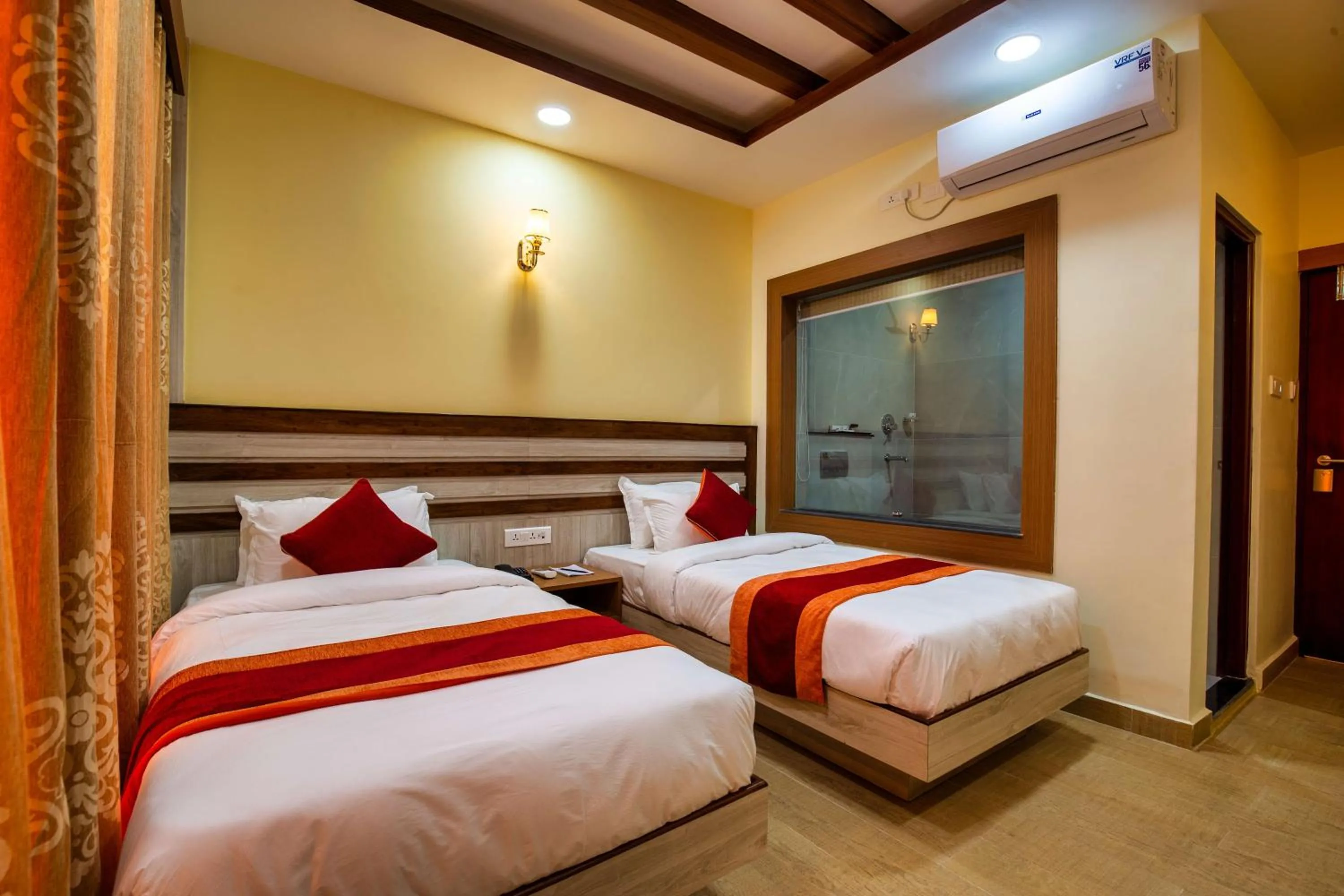 Bed in Chitwan Midtown Hotel