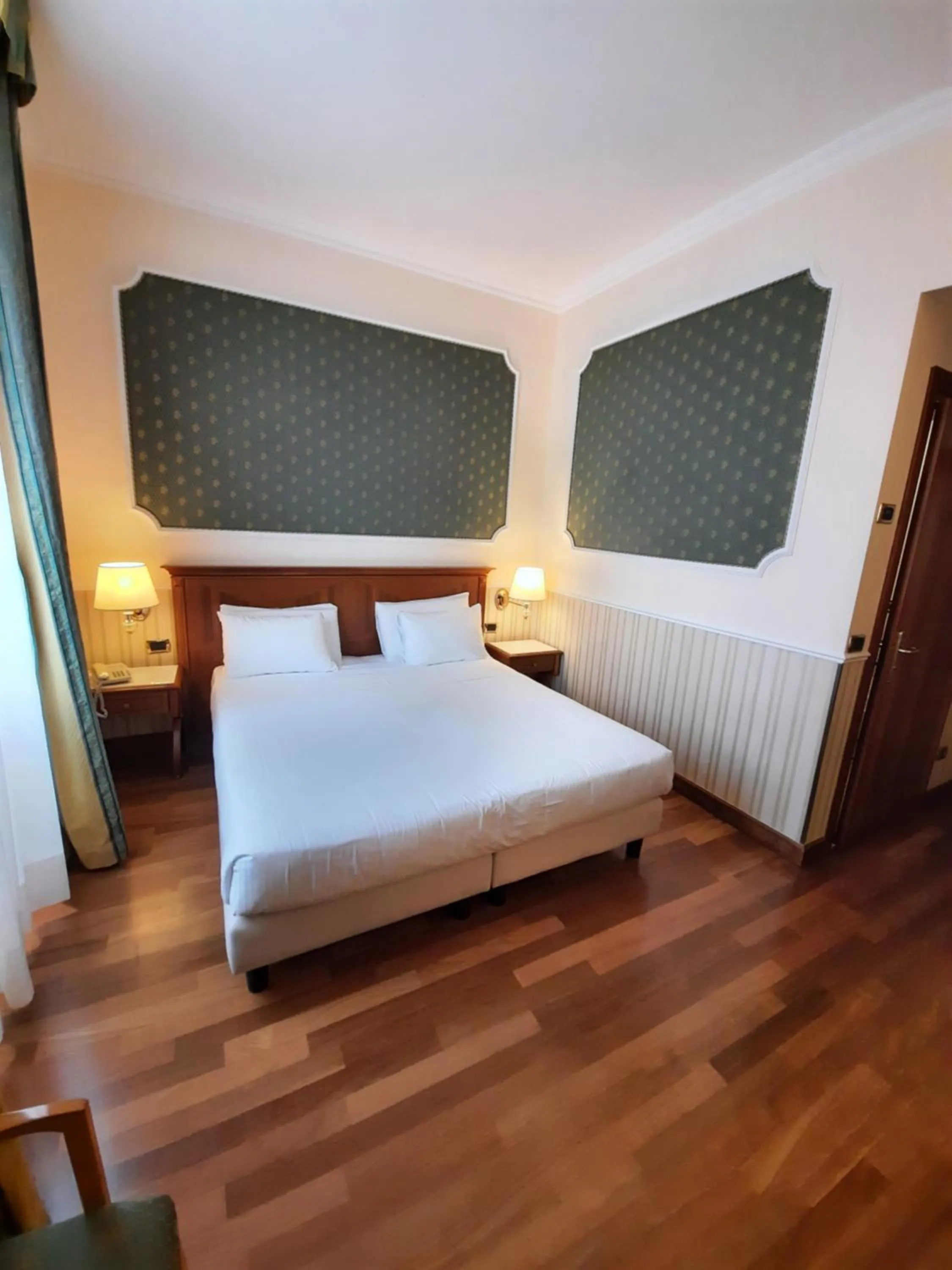 Bedroom, Bed in Andreola Central Hotel