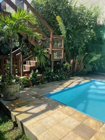 Pousada Casa de mãe aconchegante com piscina próximo à praia