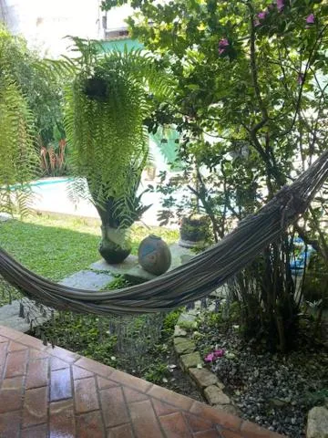 Pousada Casa de mãe aconchegante com piscina próximo à praia