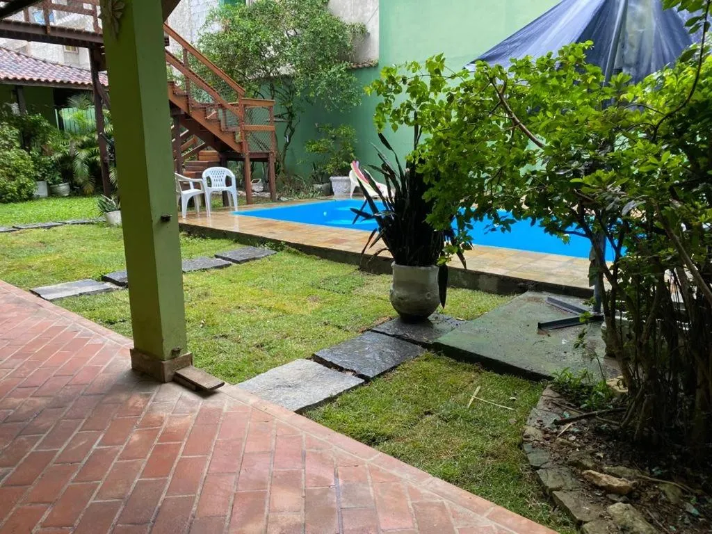 Pousada Casa de mãe aconchegante com piscina próximo à praia