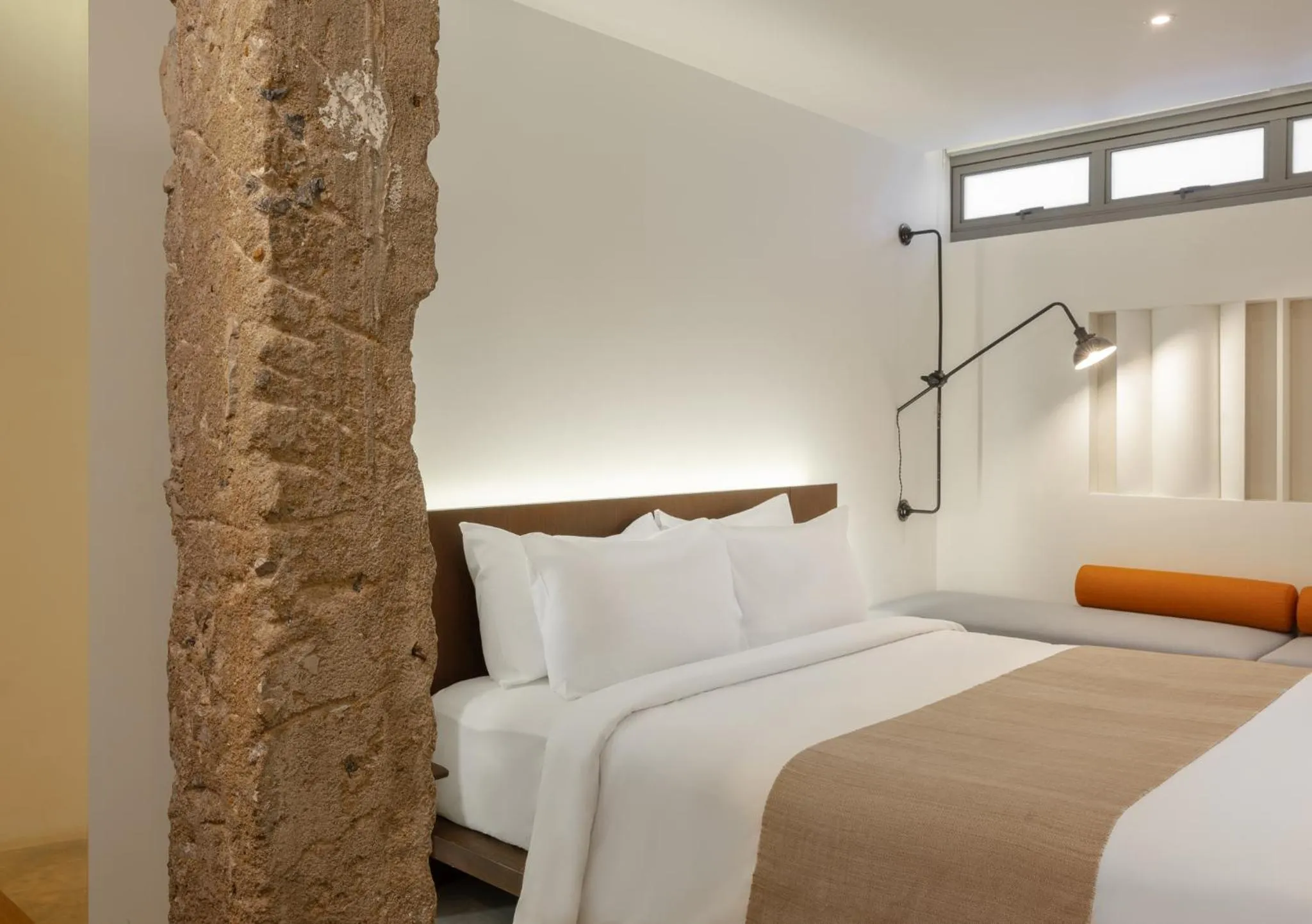 Bed in Nidhra Boutique Hotel Bangkok Sukhumvit