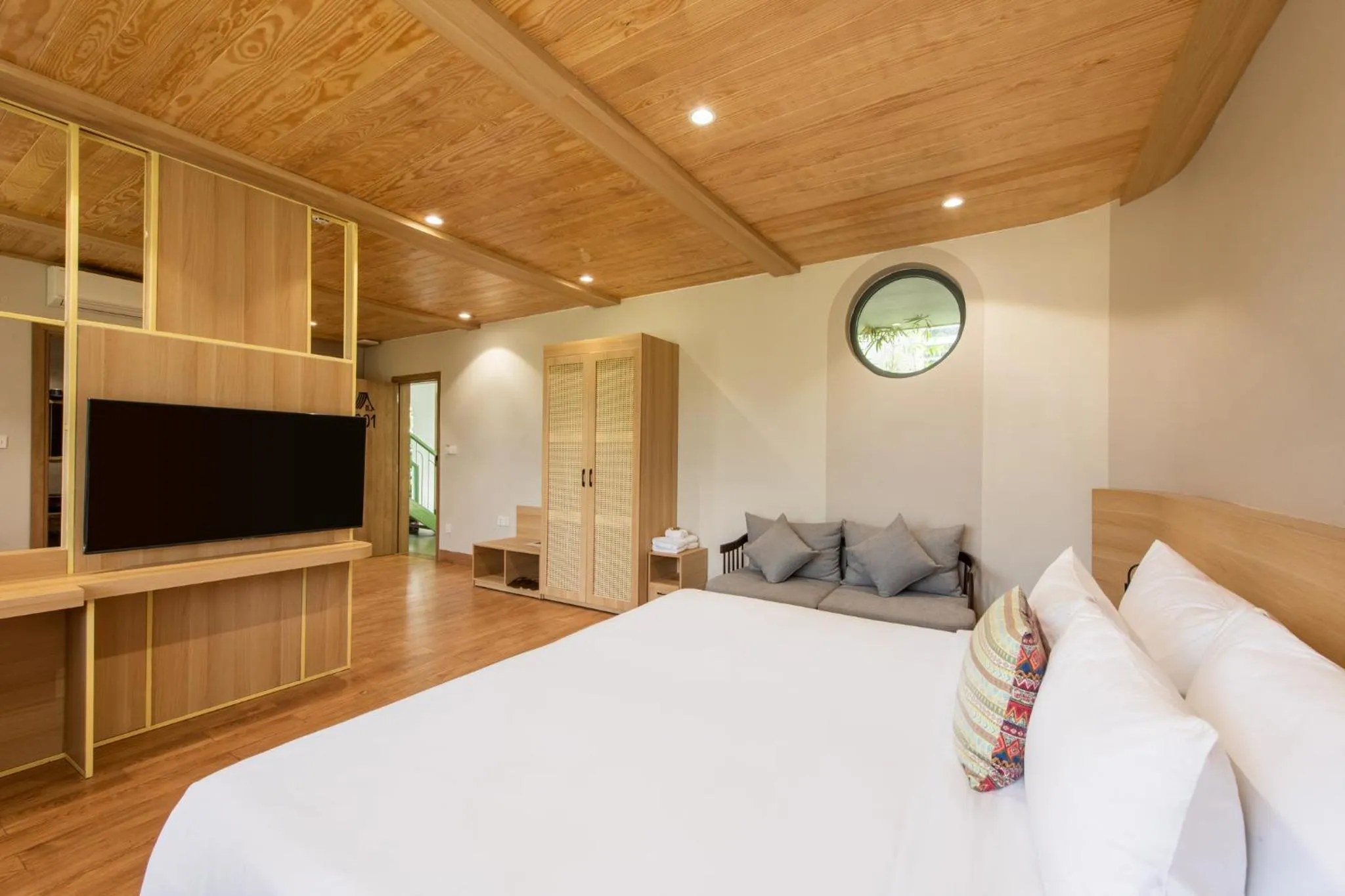 Communal lounge/ TV room, Bed in Hami Garden - Authentic & Natural Resort