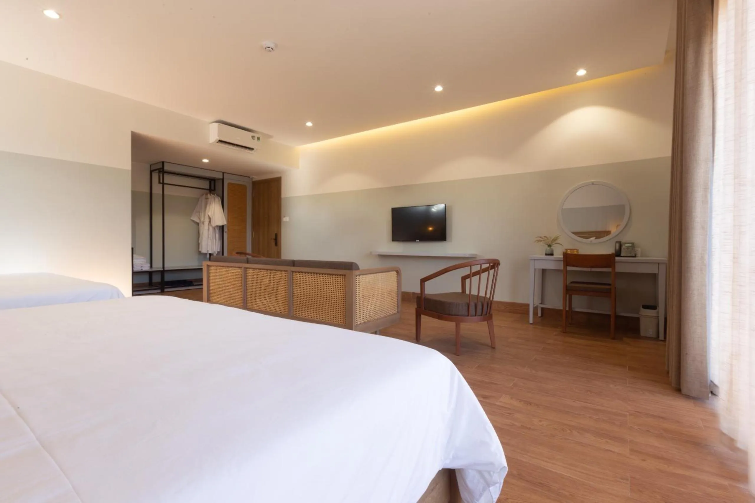 Communal lounge/ TV room, Bed in Hami Garden - Authentic & Natural Resort