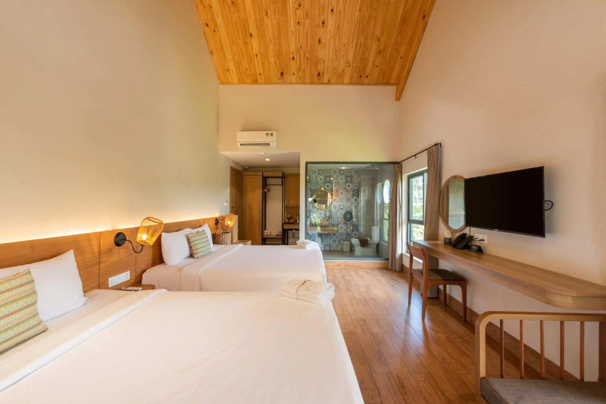 Communal lounge/ TV room, Bed in Hami Garden - Authentic & Natural Resort