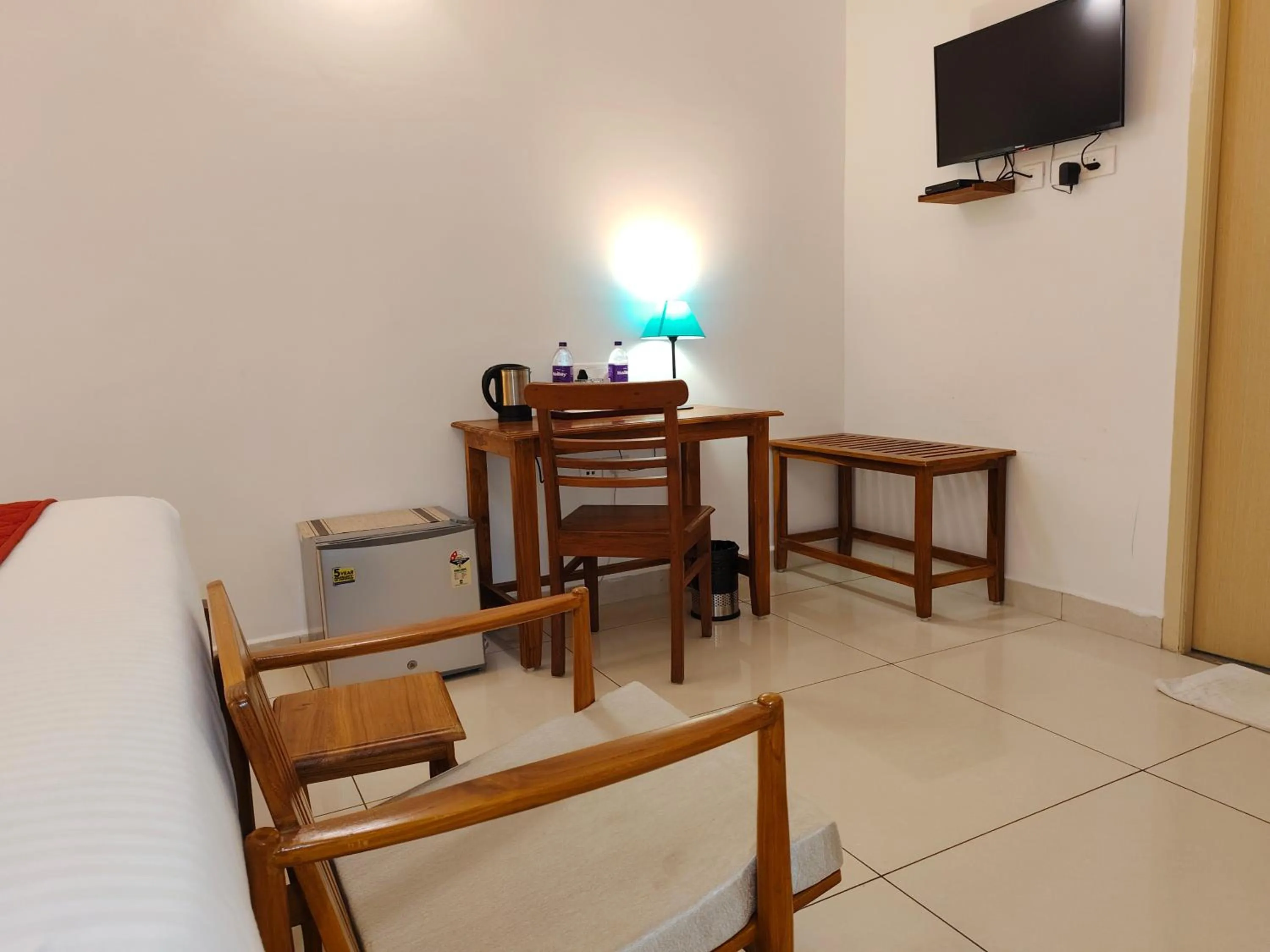 Bed in Hotel Aura by Woco Stays