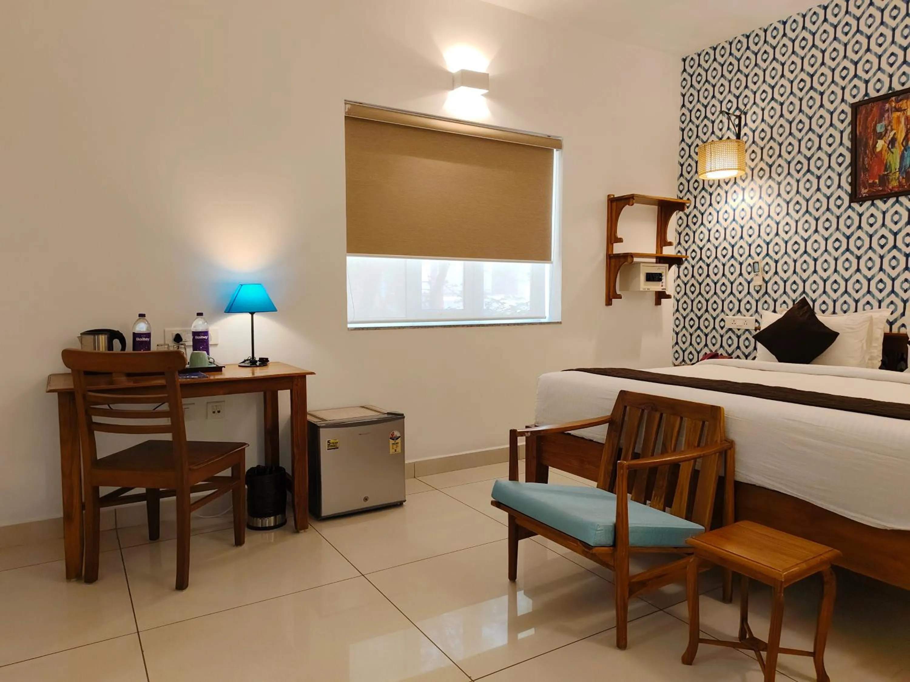 Bedroom in Hotel Aura by Woco Stays