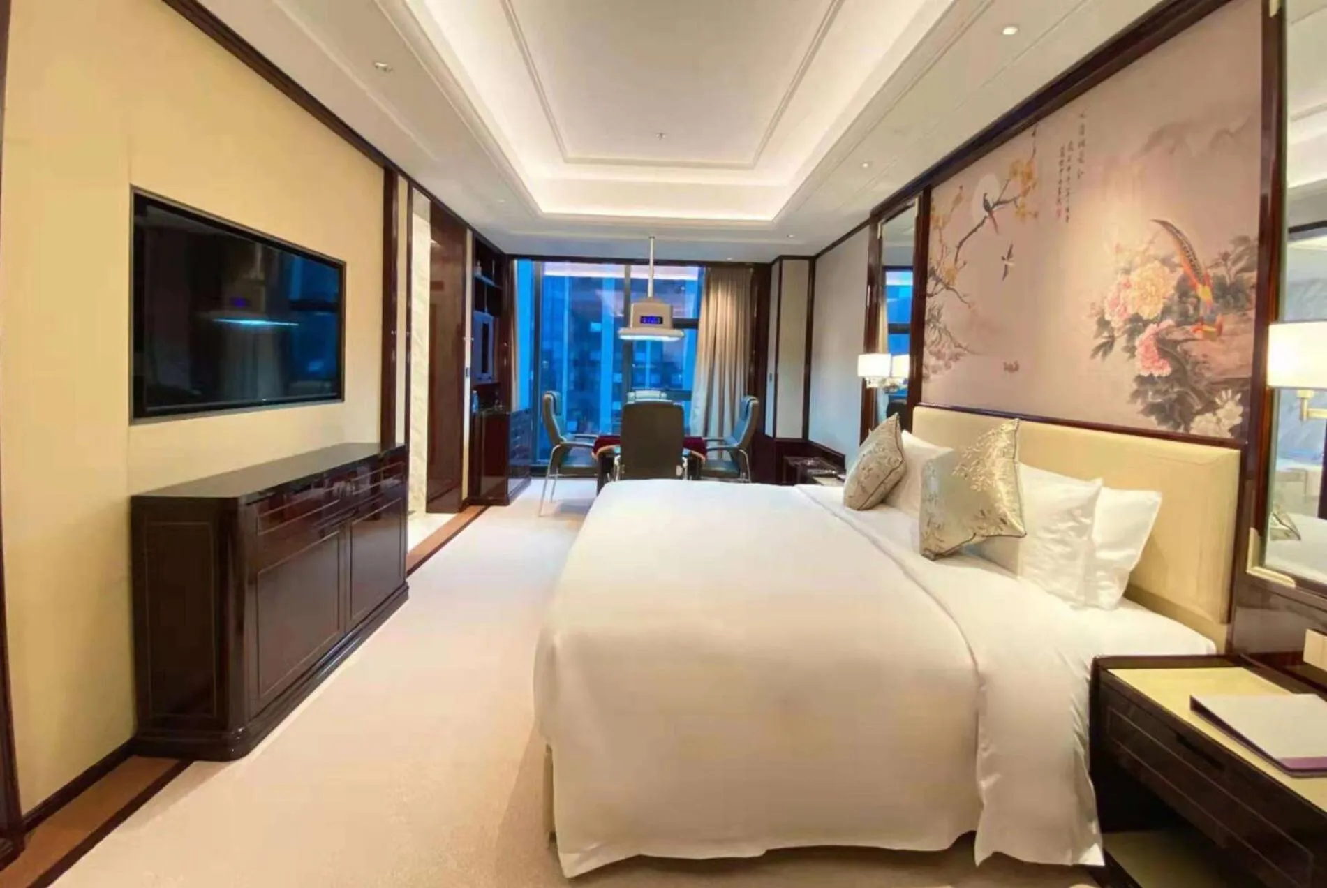 Bed in Wyndham Grand Tongren Downtown Hotel