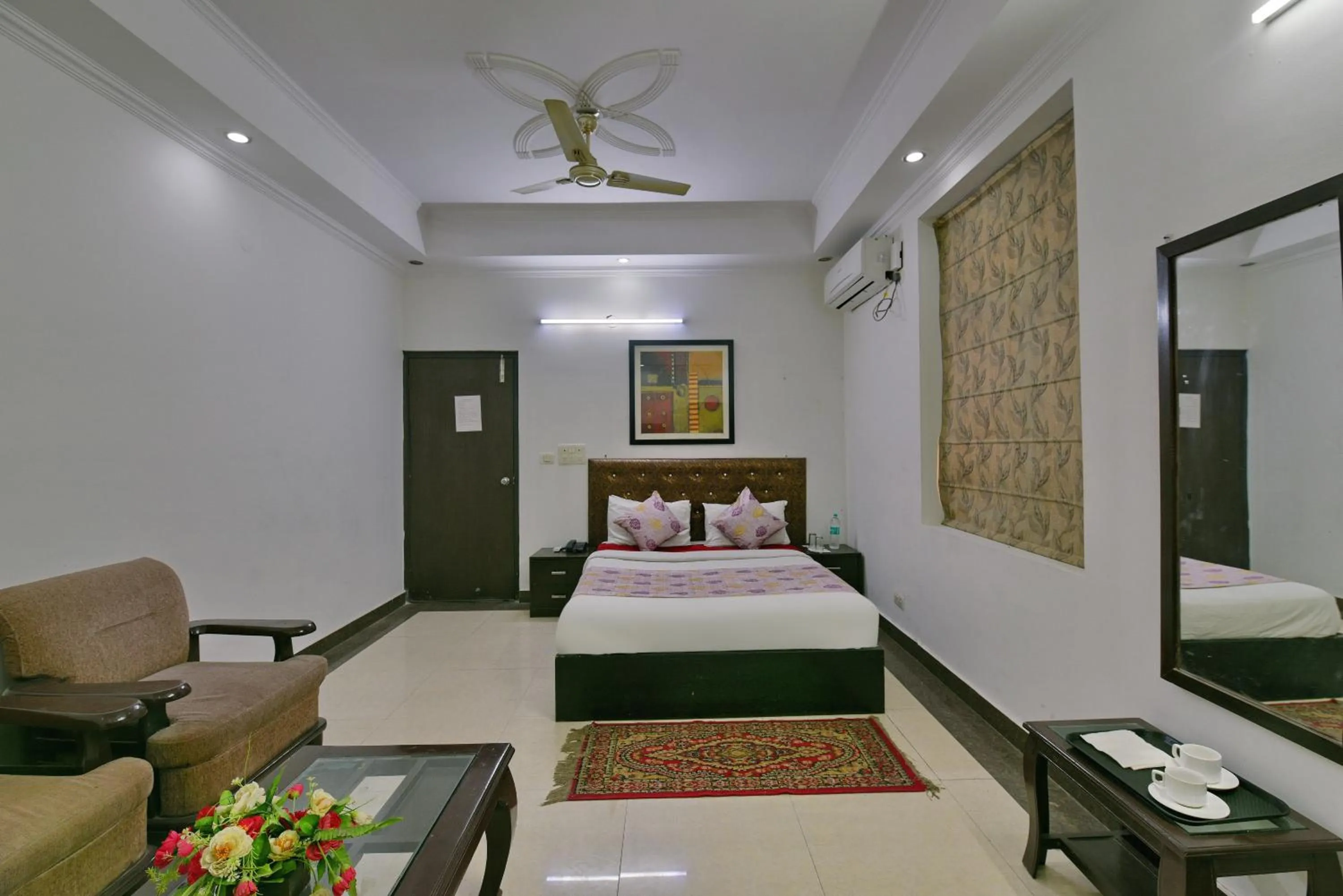 Bed in Hotel Diamond Stays