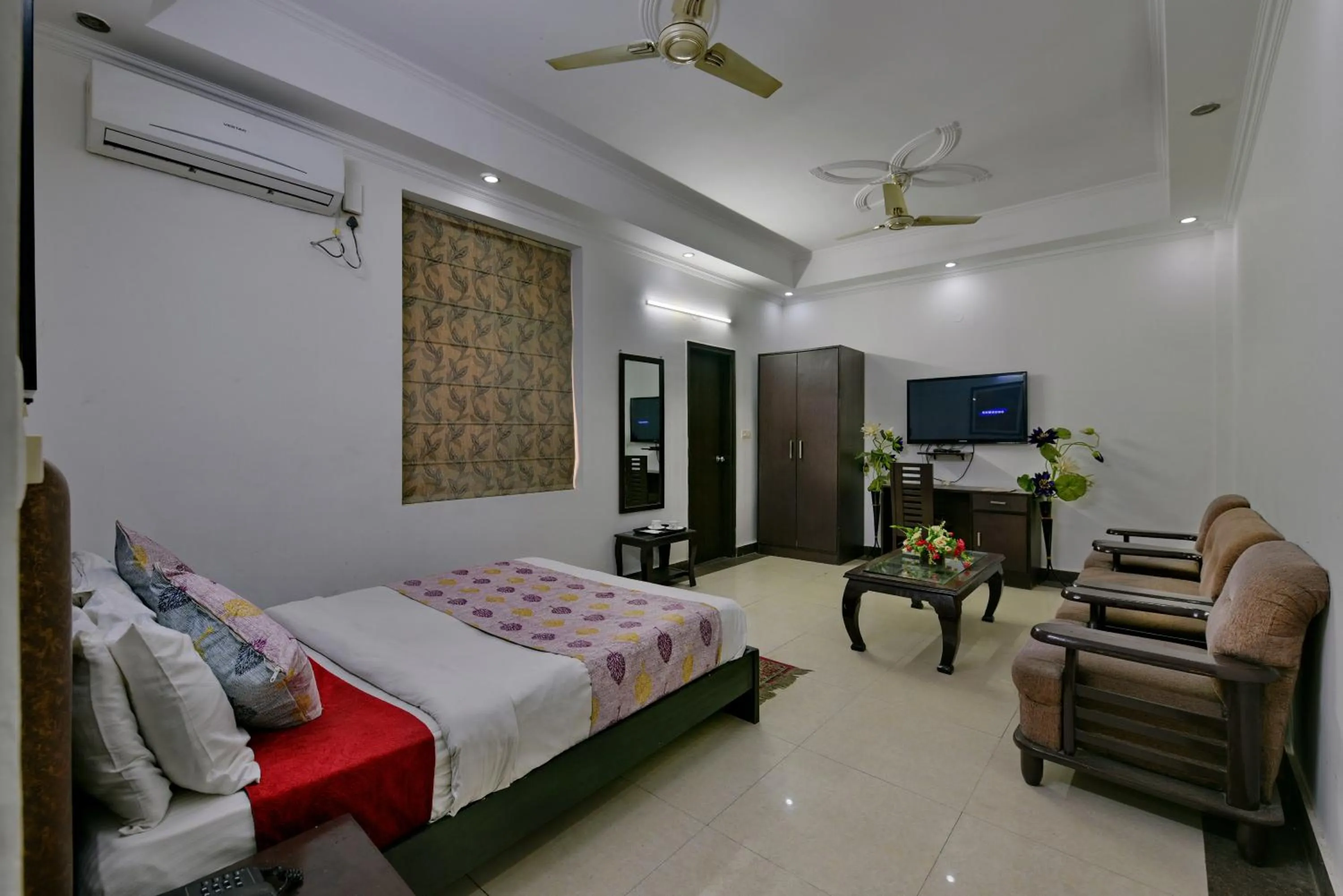 Bed in Hotel Diamond Stays