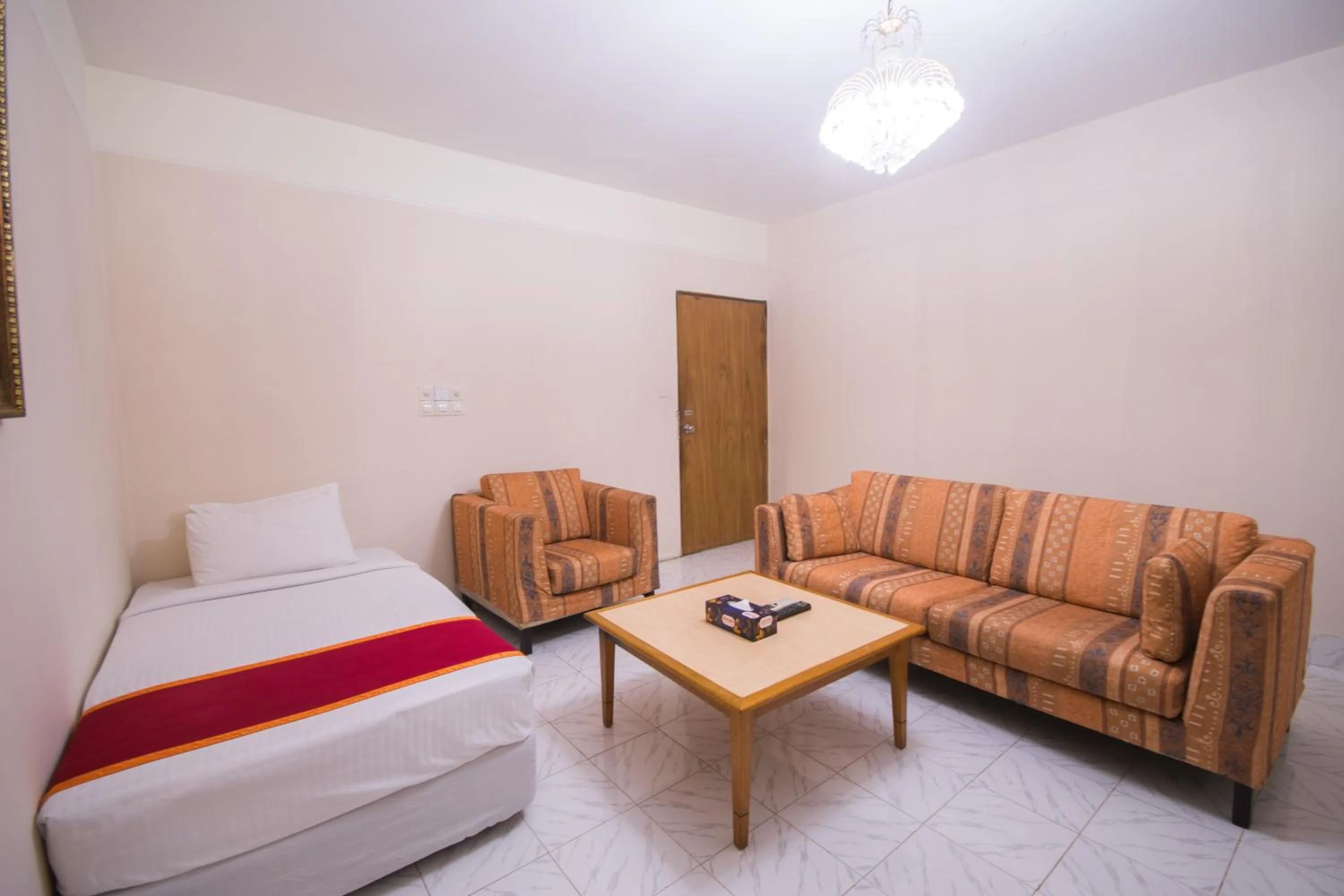 Living room, Bed in Hotel The Enchanted Residence